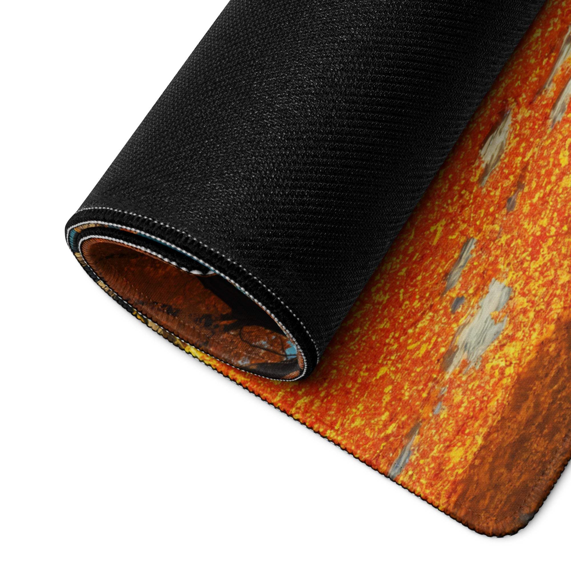 Rolled-up Autumn Landscape orange gaming mouse pad with vibrant design