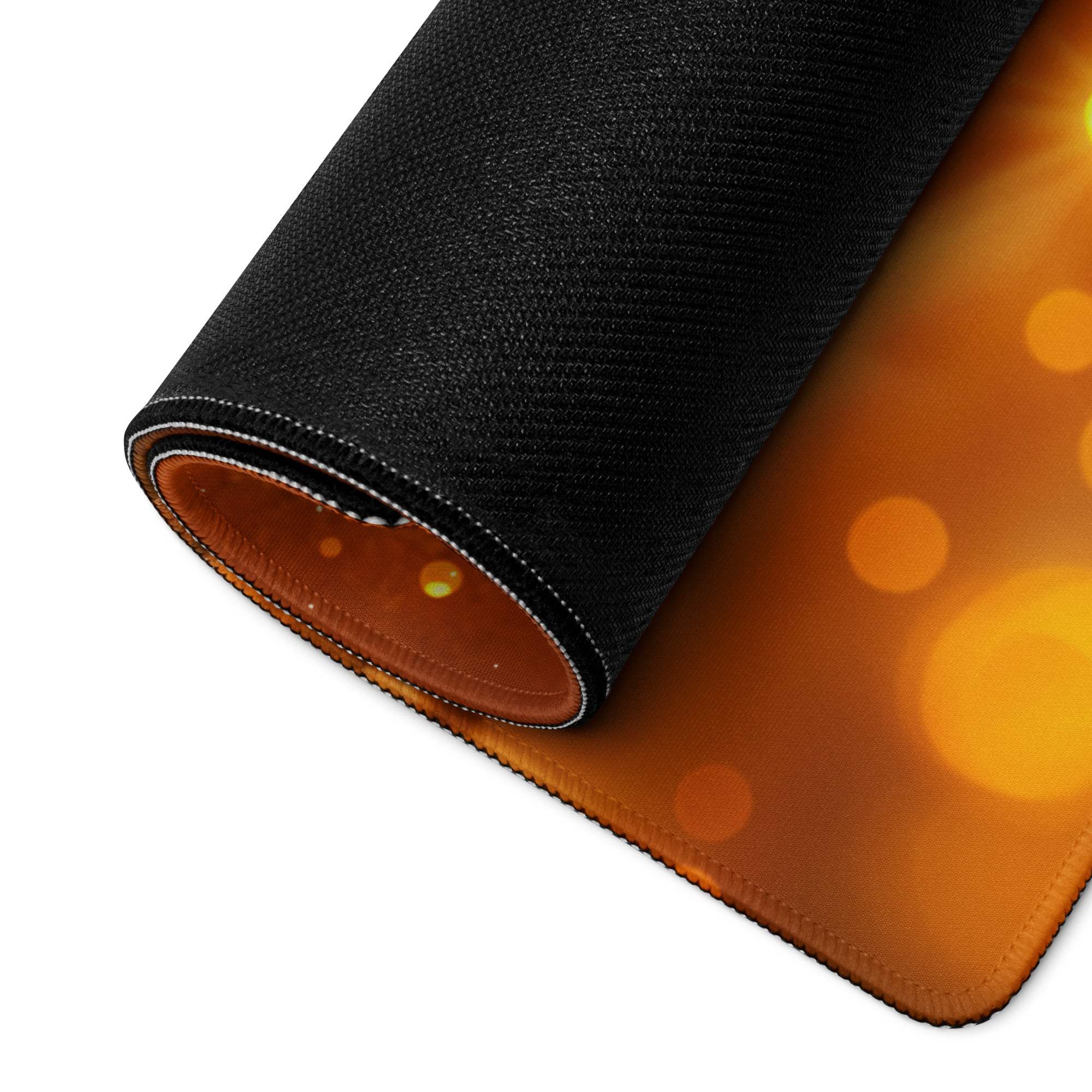 Vibrant black orange bokeh gaming mousepad with textured surface non-slip base