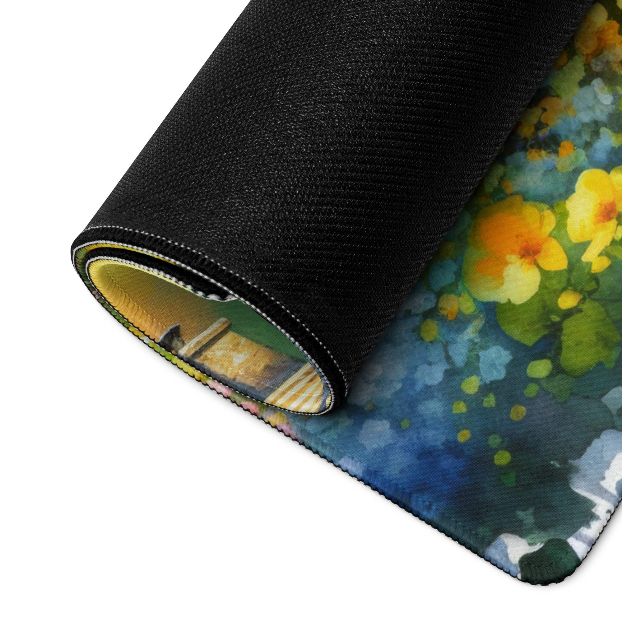 Rolled-up Vibrant Watercolor Cottage Garden gaming mouse pad with floral design