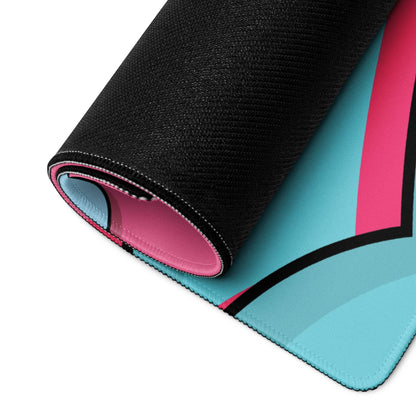 Rolled-up Whimsical Cartoon Landscape gaming mouse pad in turquoise pink with black trim