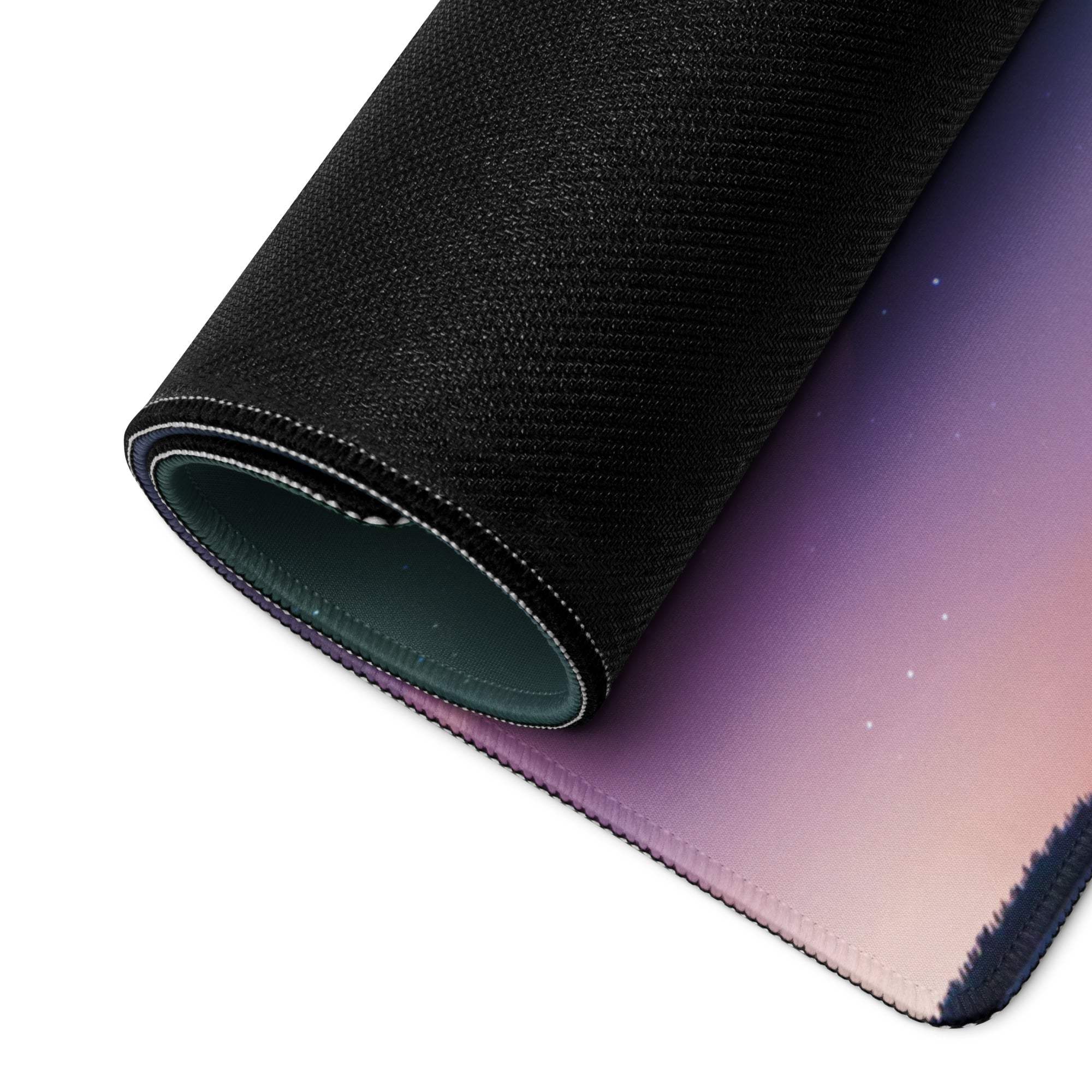 Rolled-up Aurora Night Sky gaming mouse pad with starry purple-pink gradient