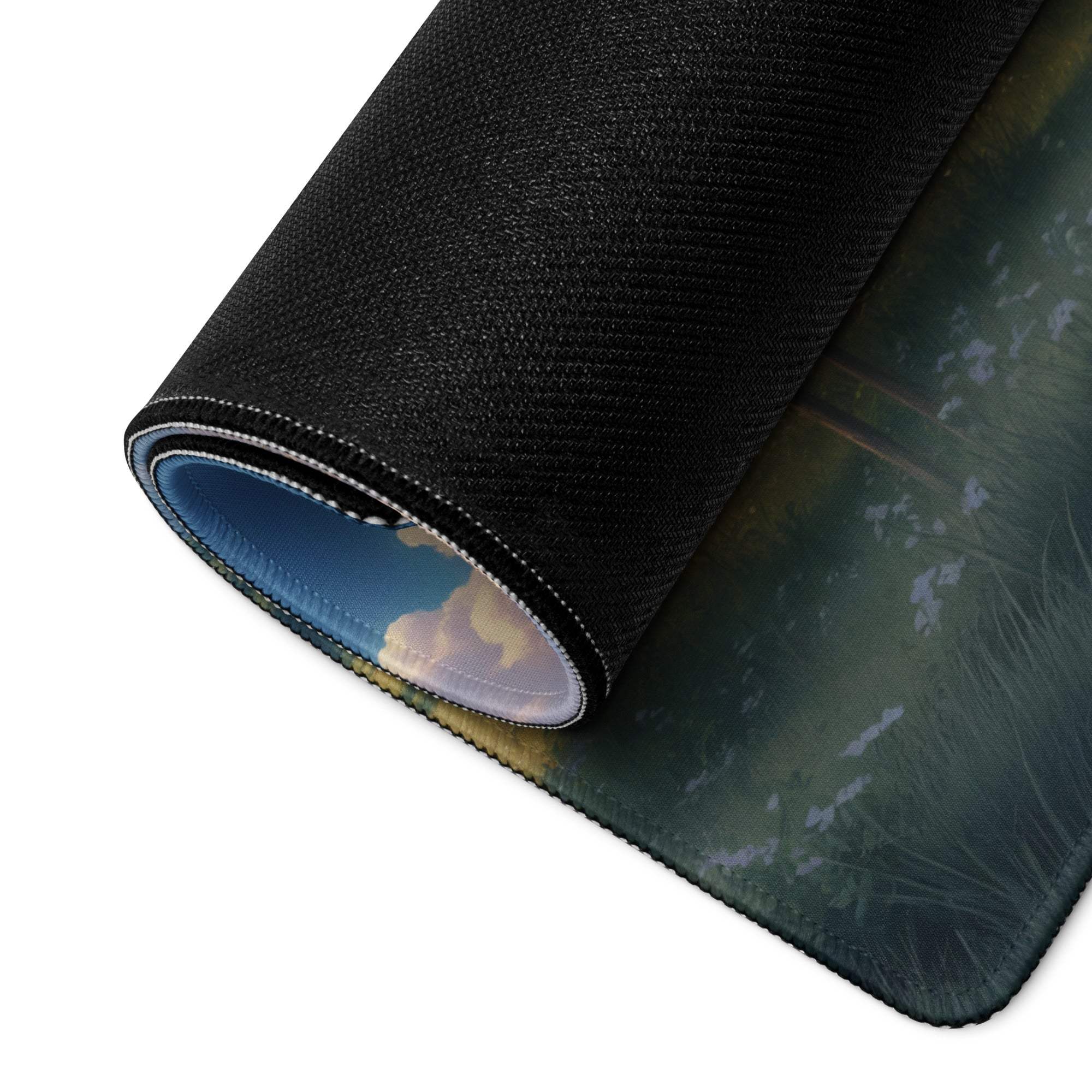 Serene countryside gaming mouse pad with green foliage print, rolled edge, non-slip base