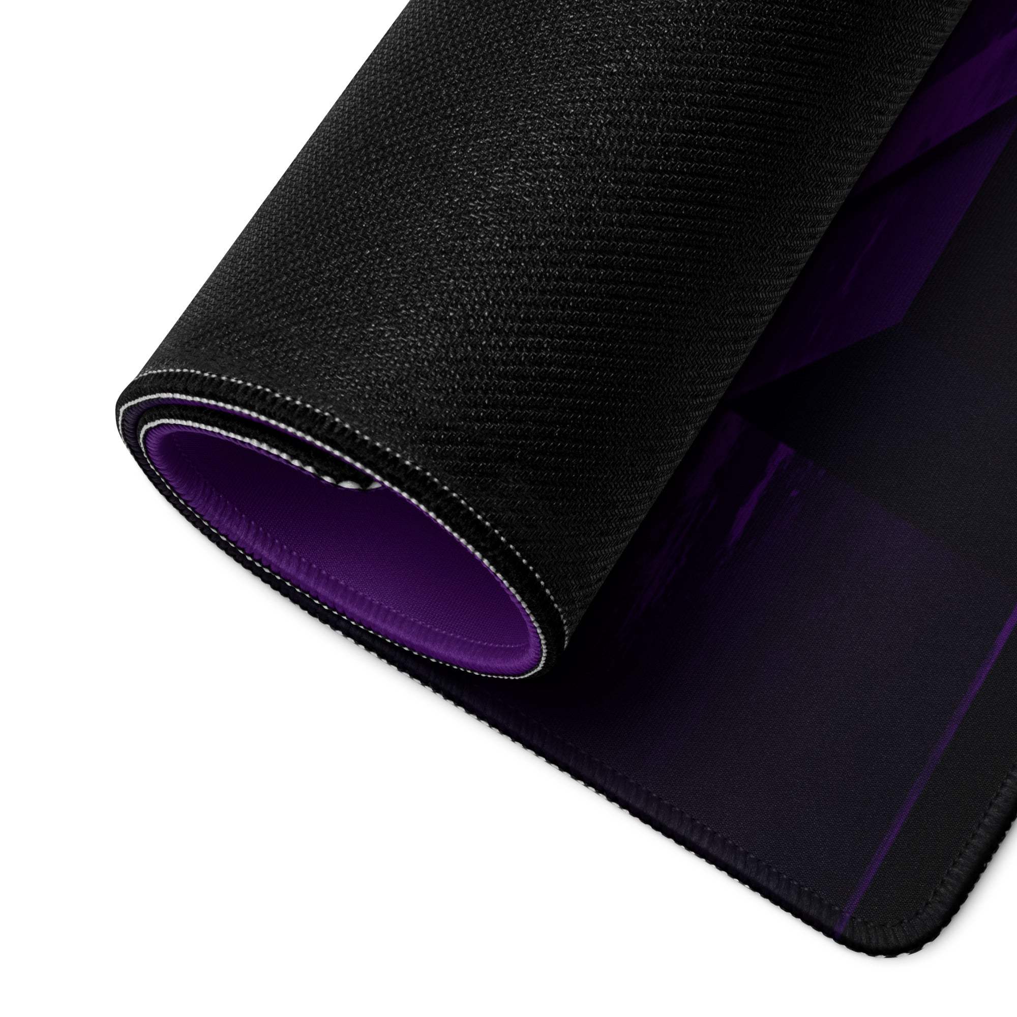 Black textured gaming mousepad with vibrant purple lining and stitching