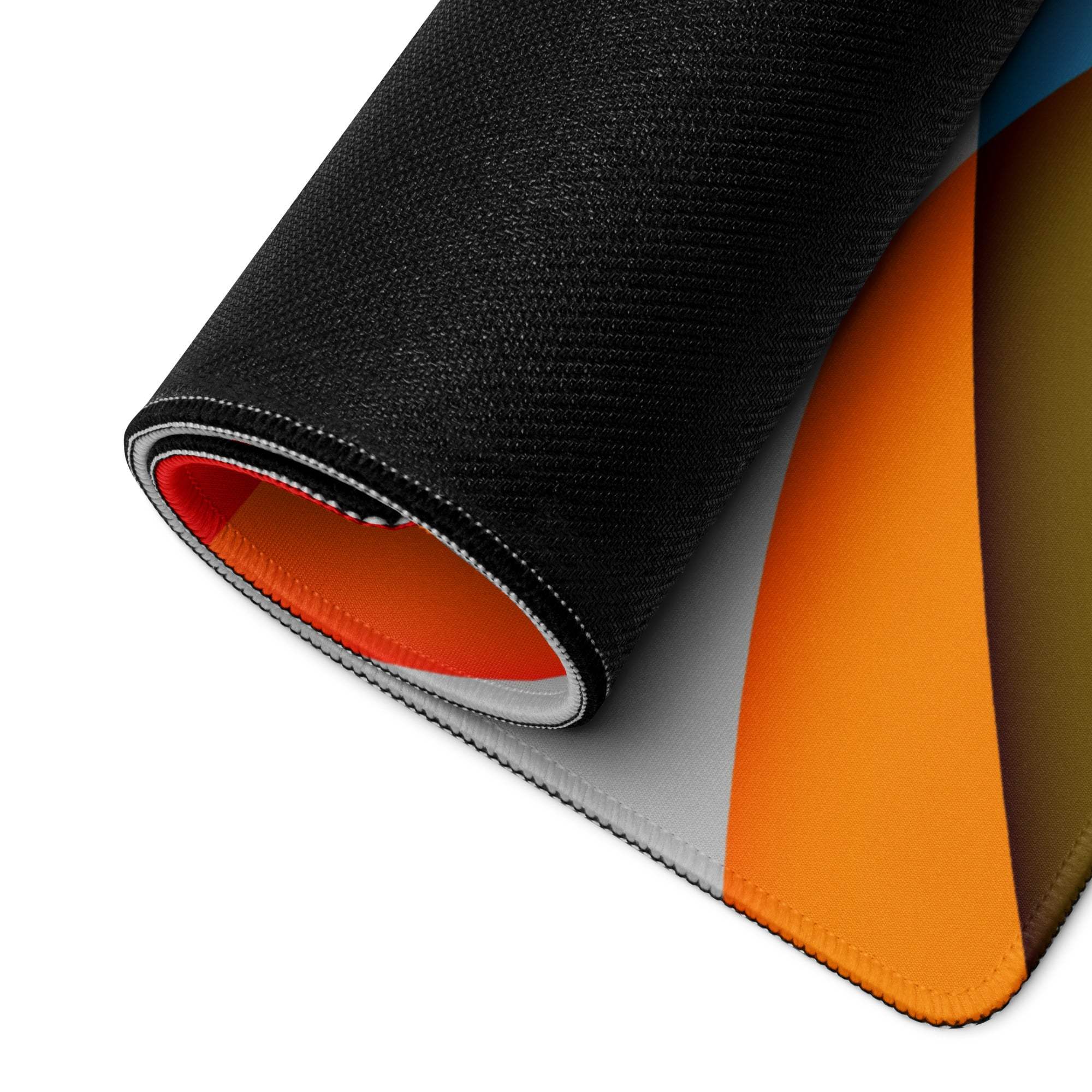 Black textured mousepad with orange gray accents, rolled layered design