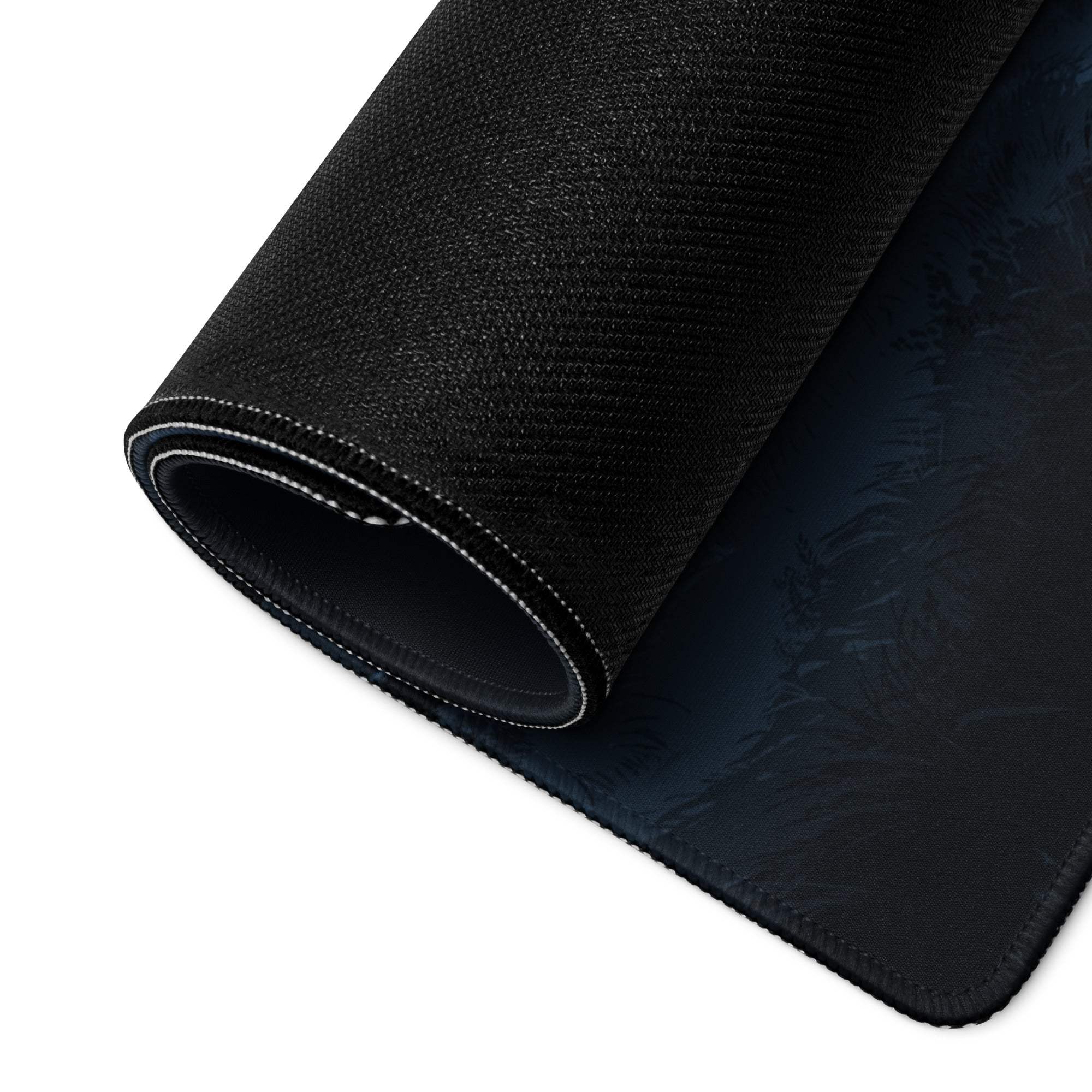 Black textured gaming mousepad with embossed design, reinforced edges, moonlit night deep blue style