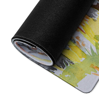 Rolled-up watercolor sunflower gaming mouse pad with non-slip surface and edge stitching