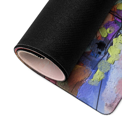 Black textured gaming mouse pad with vibrant abstract purple yellow blue orange design