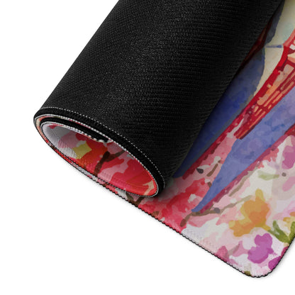Rolled-up artistic cherry blossom gaming mouse pad with Golden Gate Bridge watercolor design