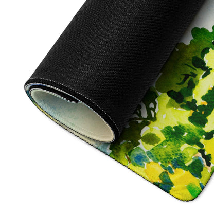 Rolled watercolor landscape gaming mousepad with green foliage, non-slip backing