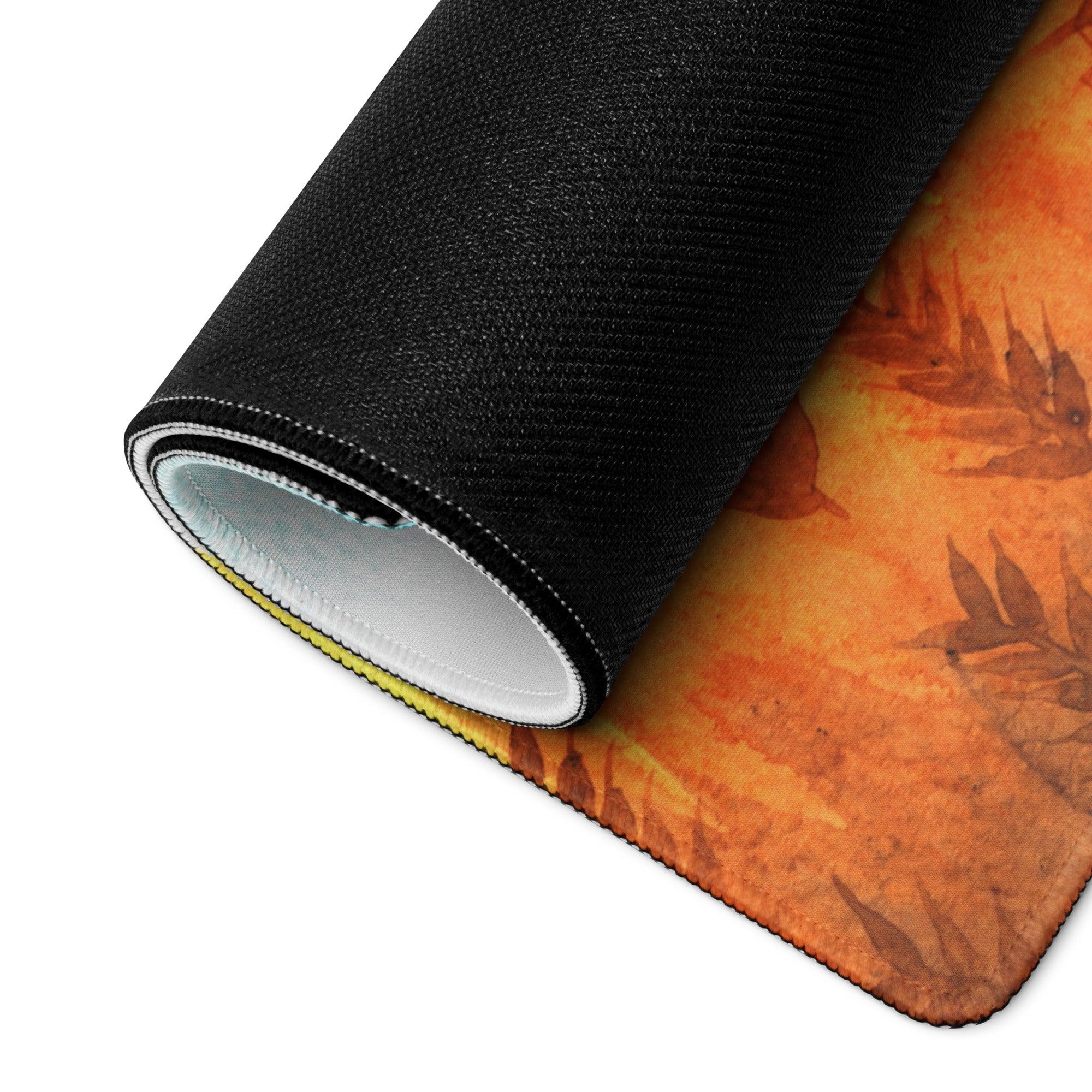 Rolled-up Autumn Leaves gaming mouse pad with orange brown leafy design