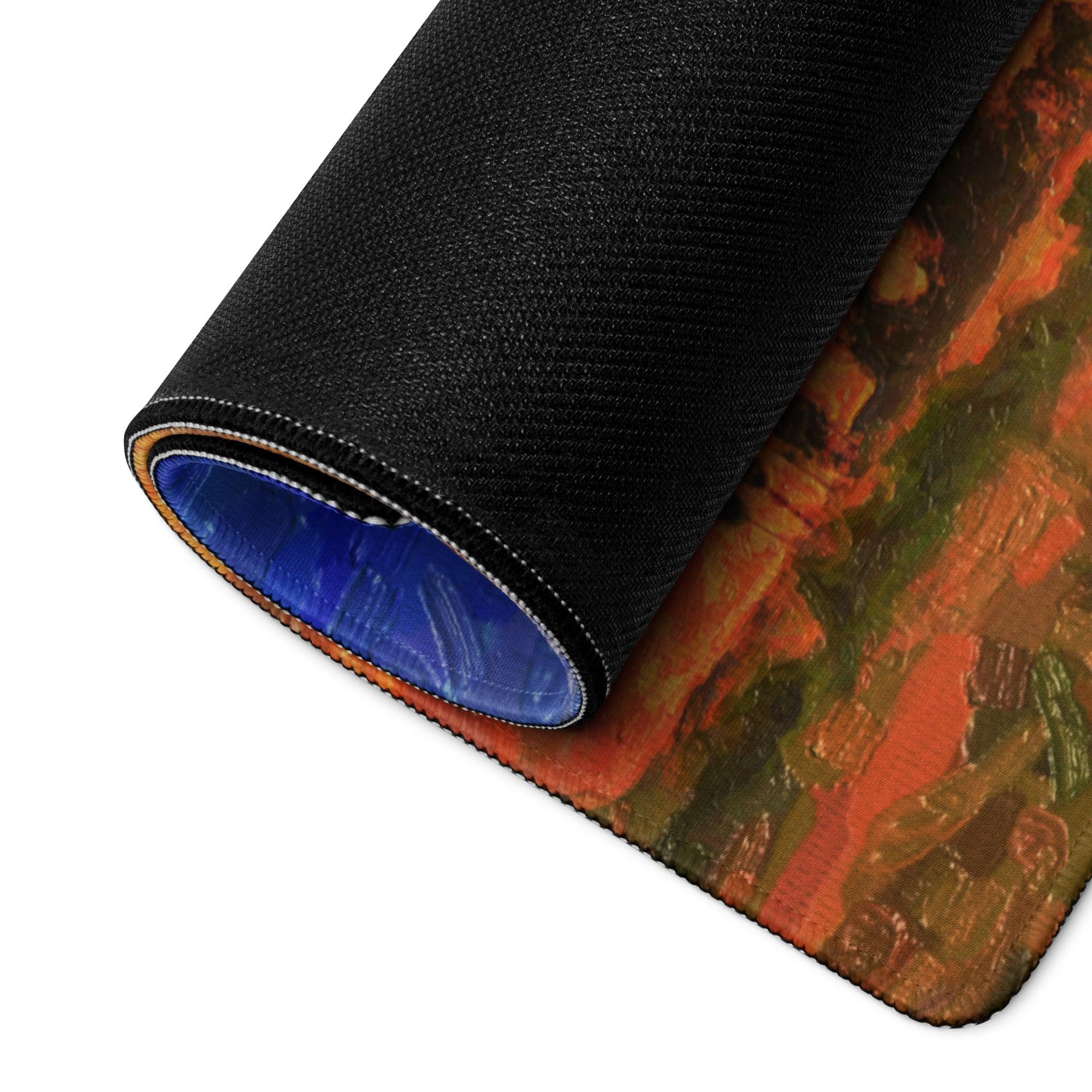 Black gaming mousepad with vibrant orange green impressionist sunset design