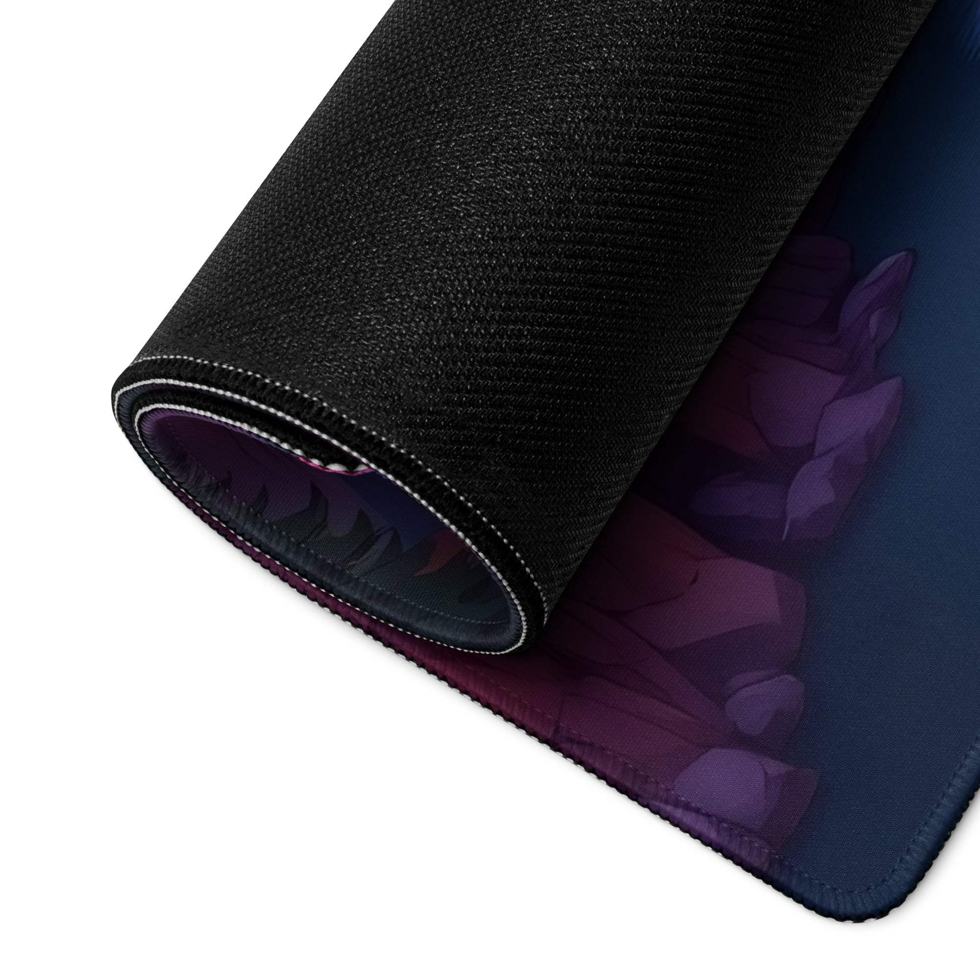 Black textured gaming mousepad rolled edge revealing dark purple navy design
