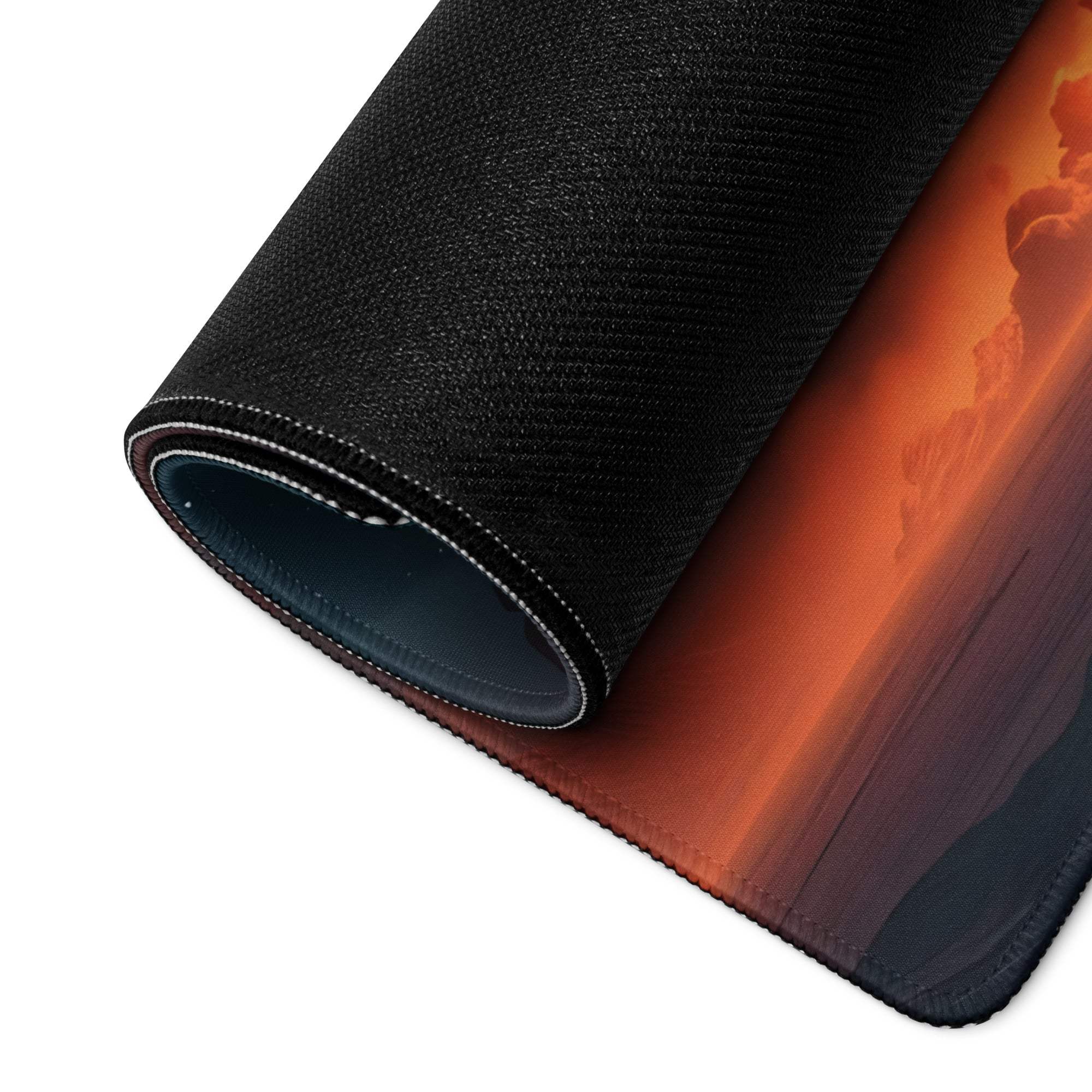 Black textured gaming mousepad with fiery orange nuclear explosion sunset design