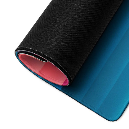 Rolled-up gradient geometric pink to blue gaming mouse pad with black textured back