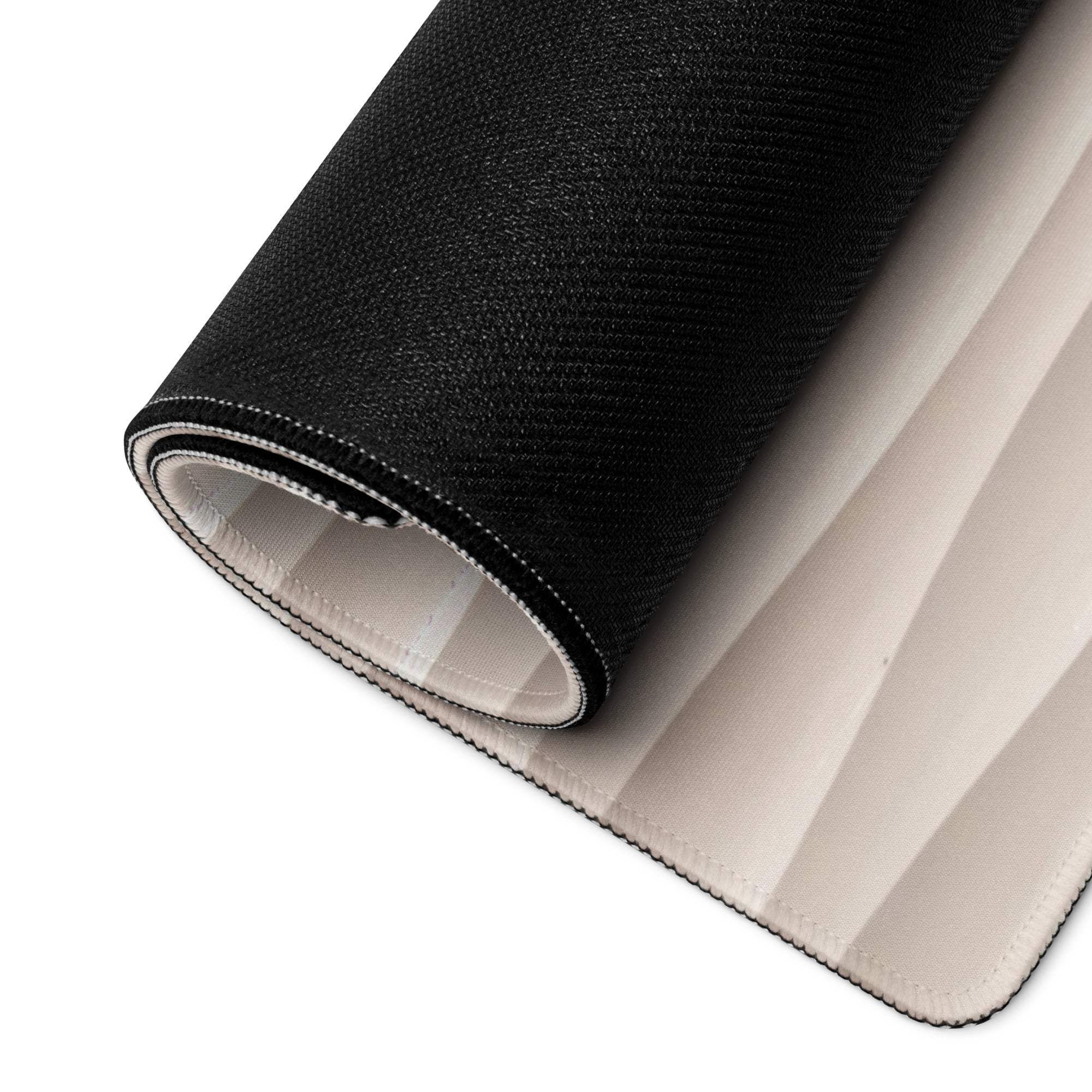 Cream beige wave textured gaming mouse pad back with black textured outer layer and beige lining