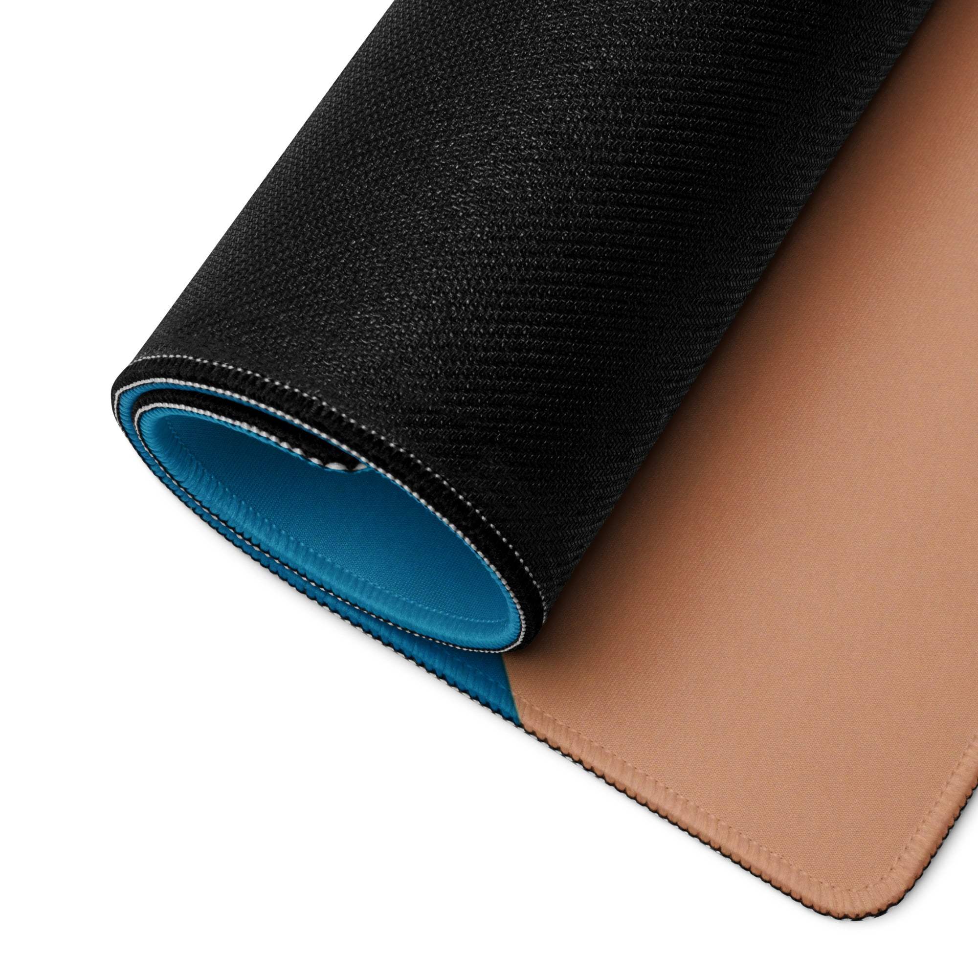 Back of blue orange gradient gaming mouse pad showing black textured layer tan leather underside blue lining