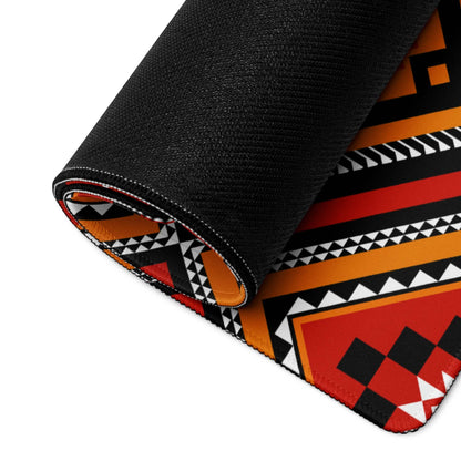Rolled-up Vibrant Tribal Geometric Diamond gaming mouse pad in bold red orange black white