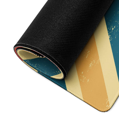 Rolled-up Retro Geometric Chevron gaming mouse pad in teal, beige, mustard stripes