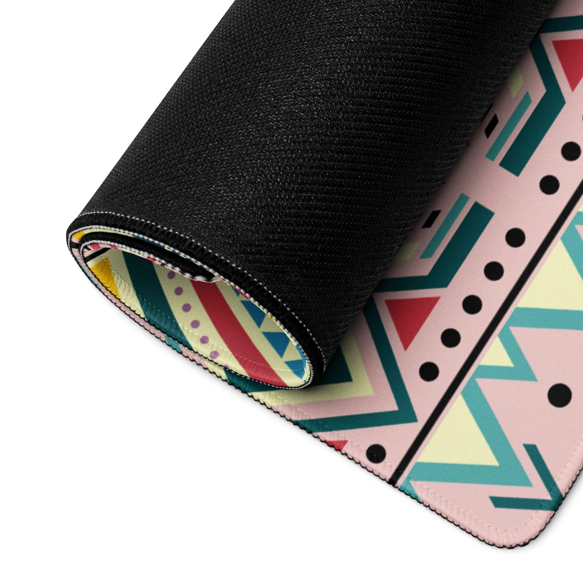 Rolled-up pink teal geometric bohemian tribal gaming mousepad non-slip base