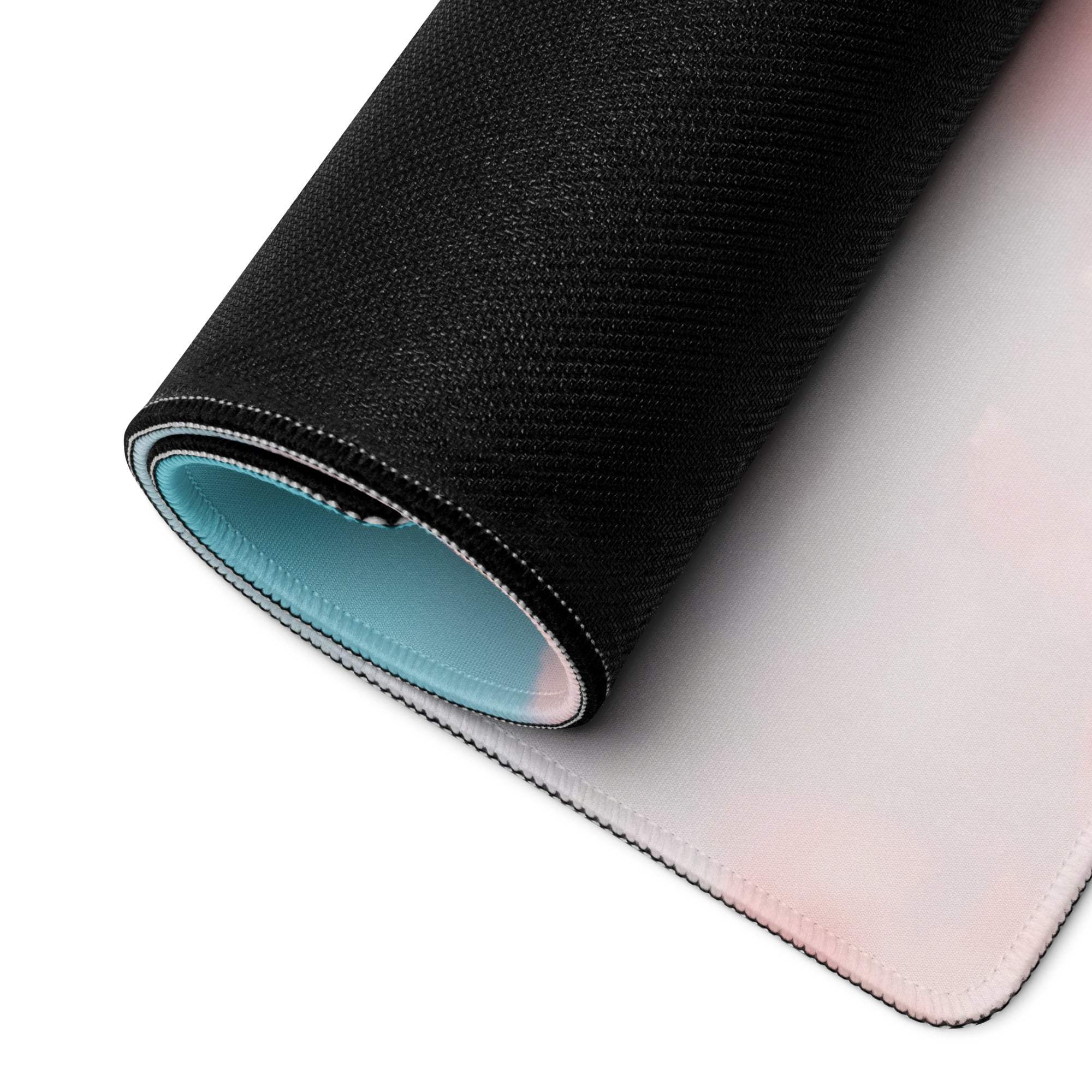 Premium large pastel sky gaming mouse pad with black texture, light blue lining, white stitched edges, non-slip base