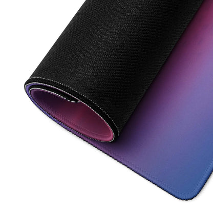 Sleek rolled-up Pastel Sunset large gaming mouse pad with purple-to-blue gradient