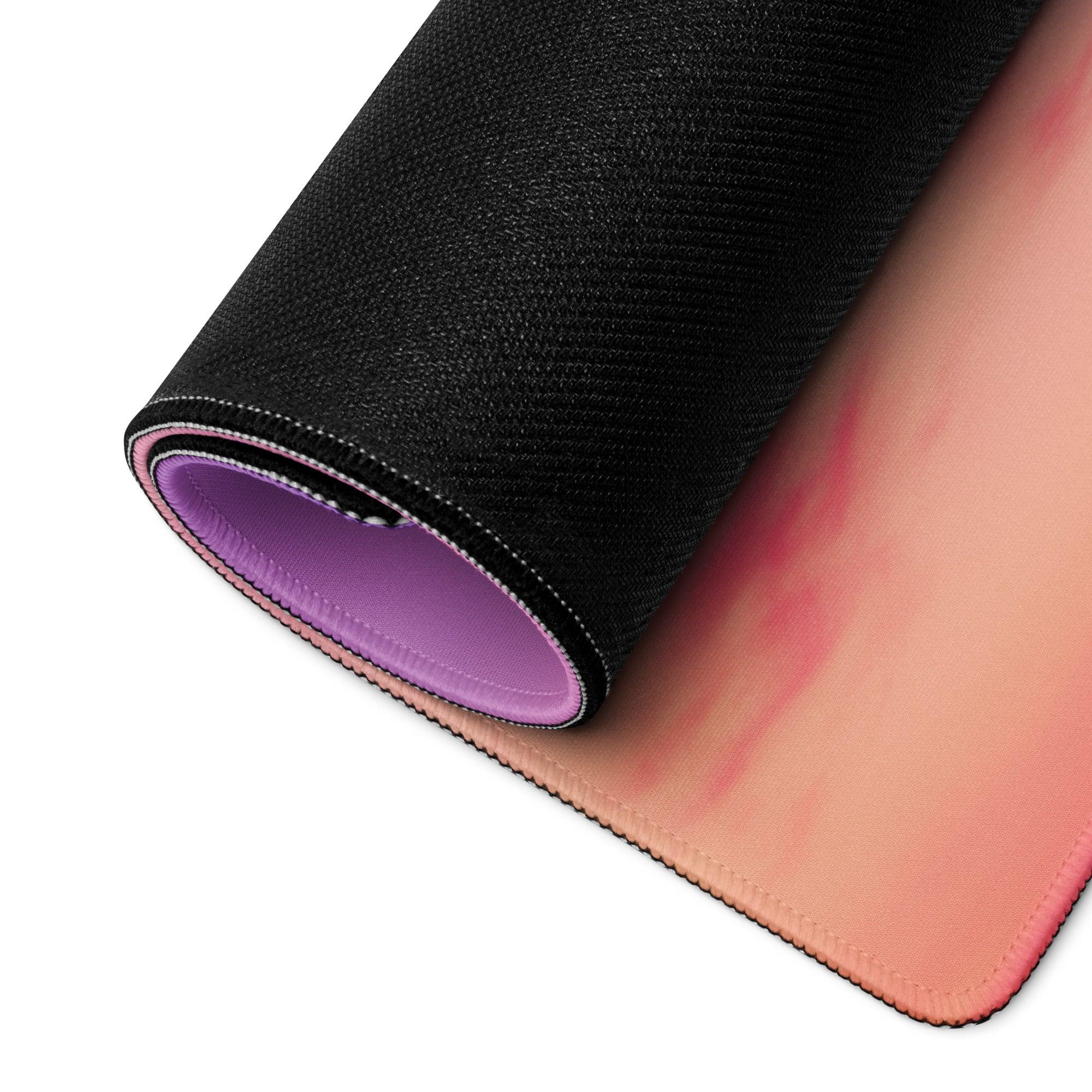 Dreamy gradient pink peach gaming mouse pad rolled up with non-slip backing