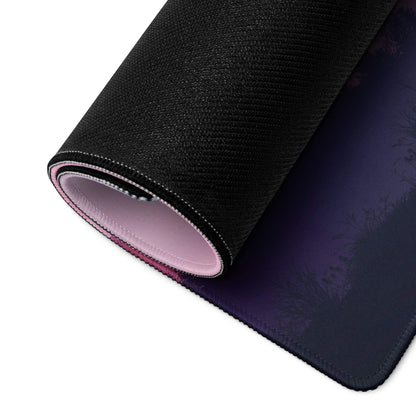 Rolled pastel pink purple sunset mountain gaming mousepad showing pink lining