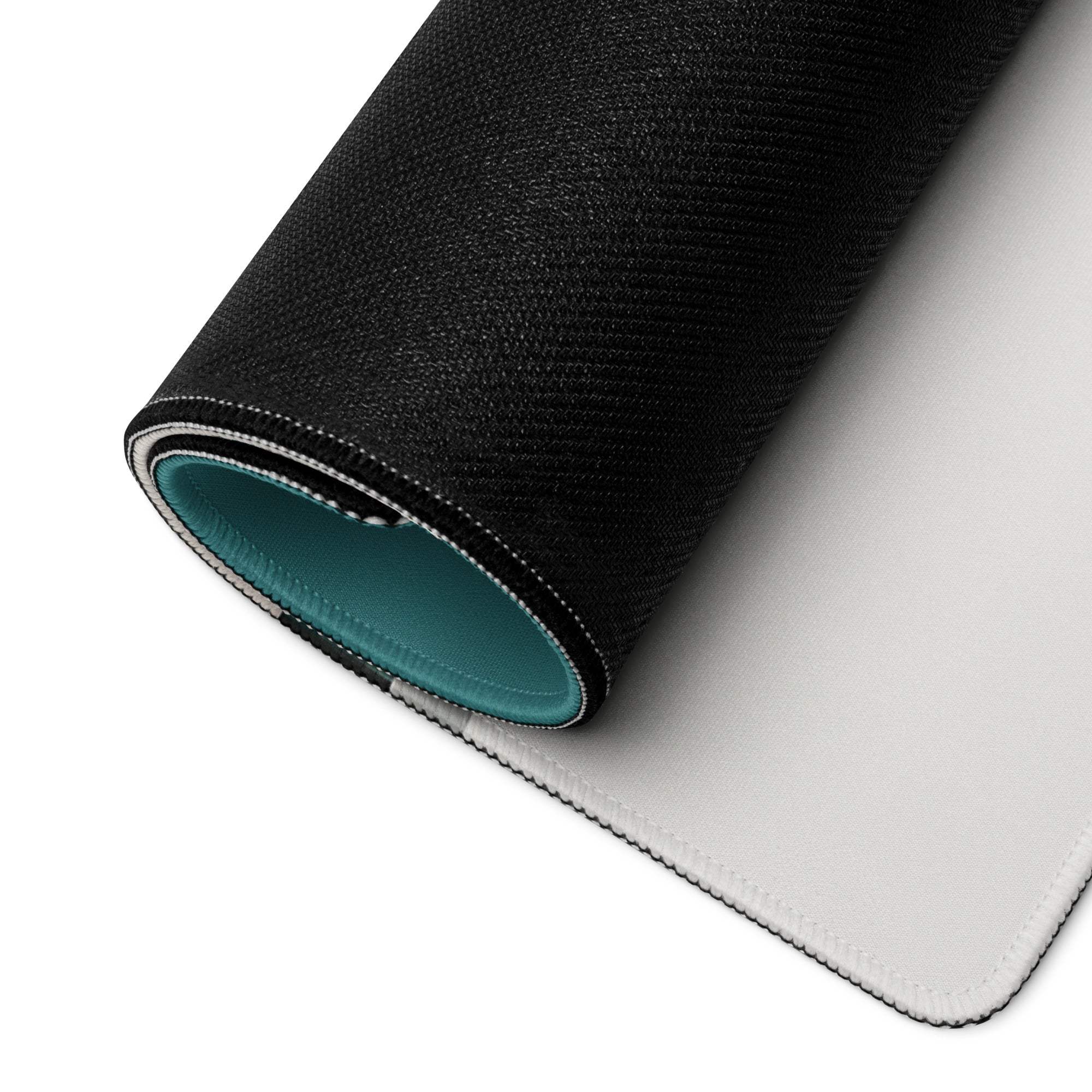 Black textured back of Cozy Winter Teal Night Scene gaming mousepad with teal lining