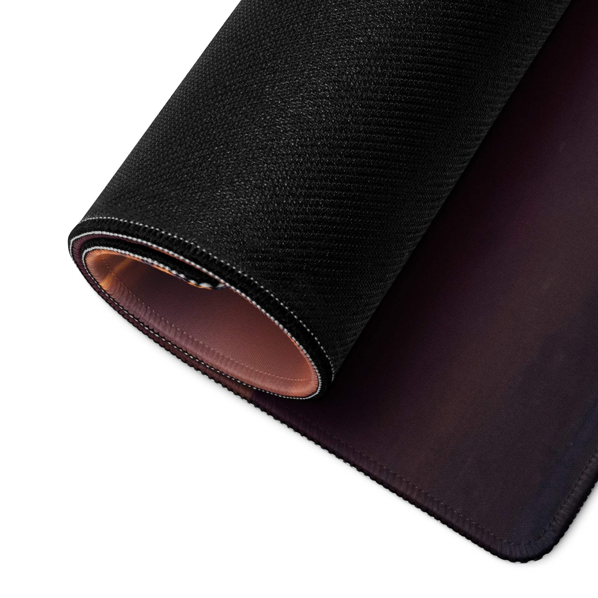 Black textured gaming mousepad with sunset mountain gradient and stitched edges