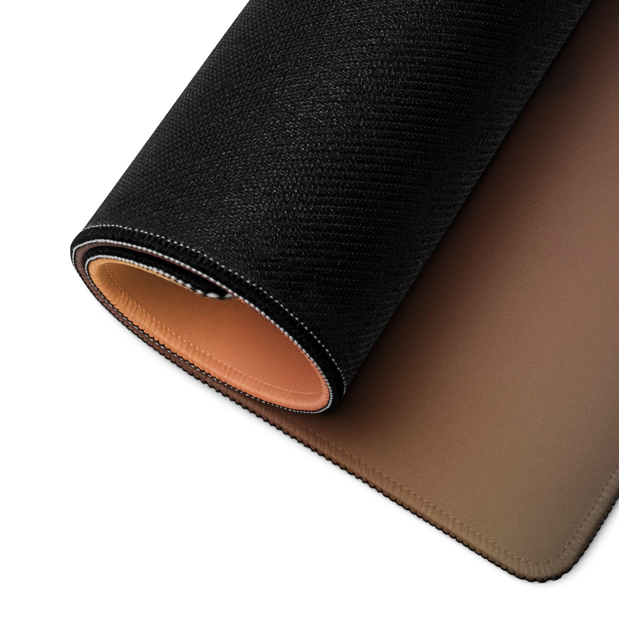 Back of Sunset Mountain gaming mouse pad: black textured exterior, tan leather interior