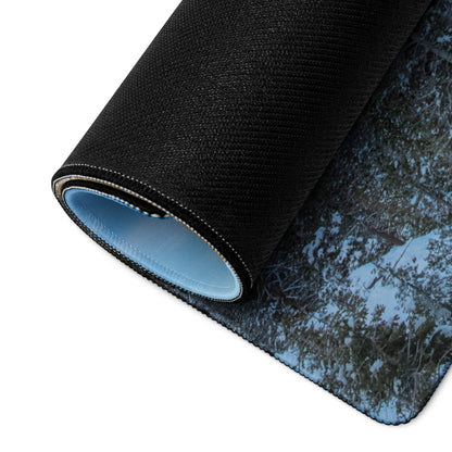 Black textured snowy forest mousepad with light blue lining and non-slip base