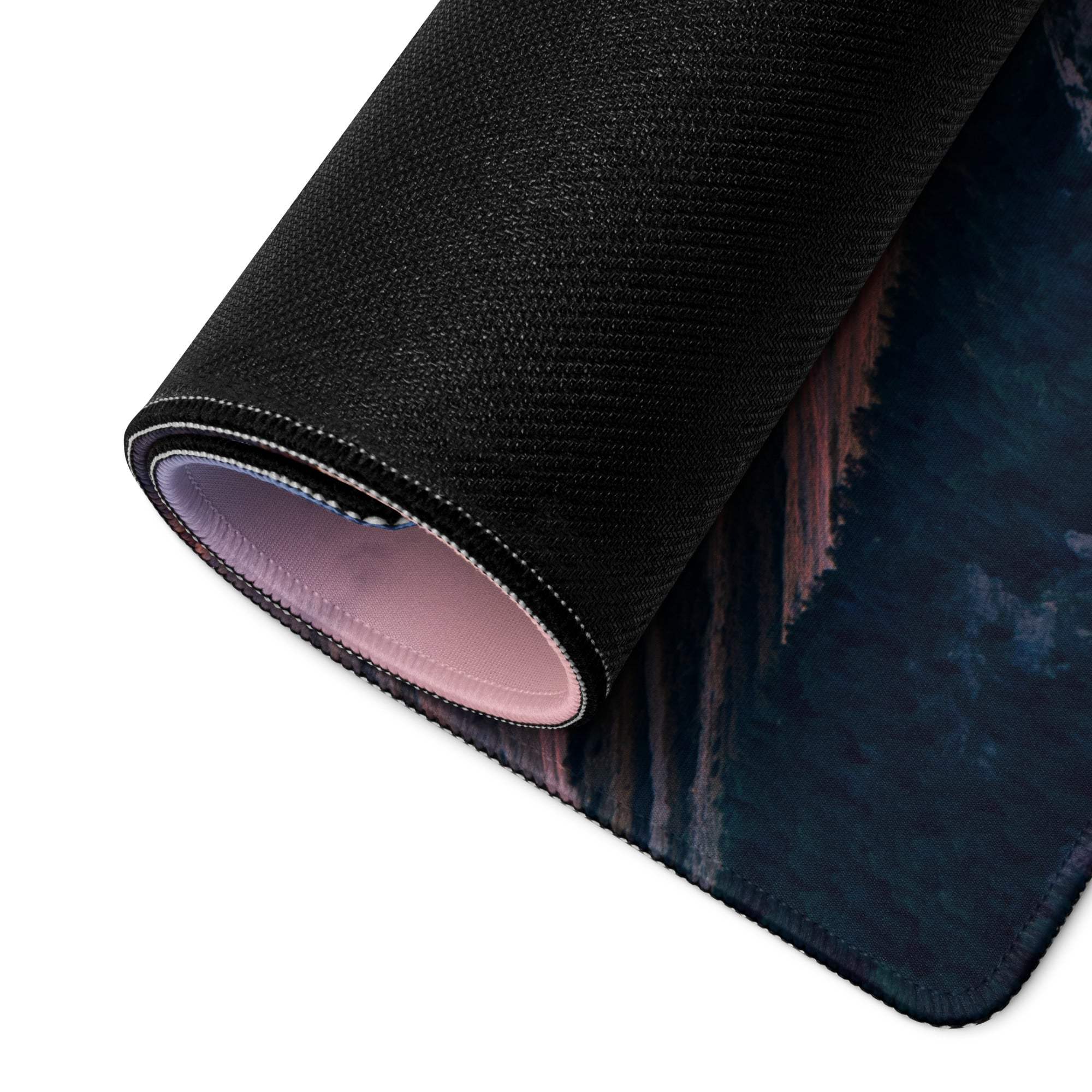 Black textured mousepad with moody forest, pink lining, non-slip base