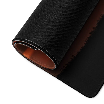 Black textured mousepad with brown leather interior, white stitching, non-slip base