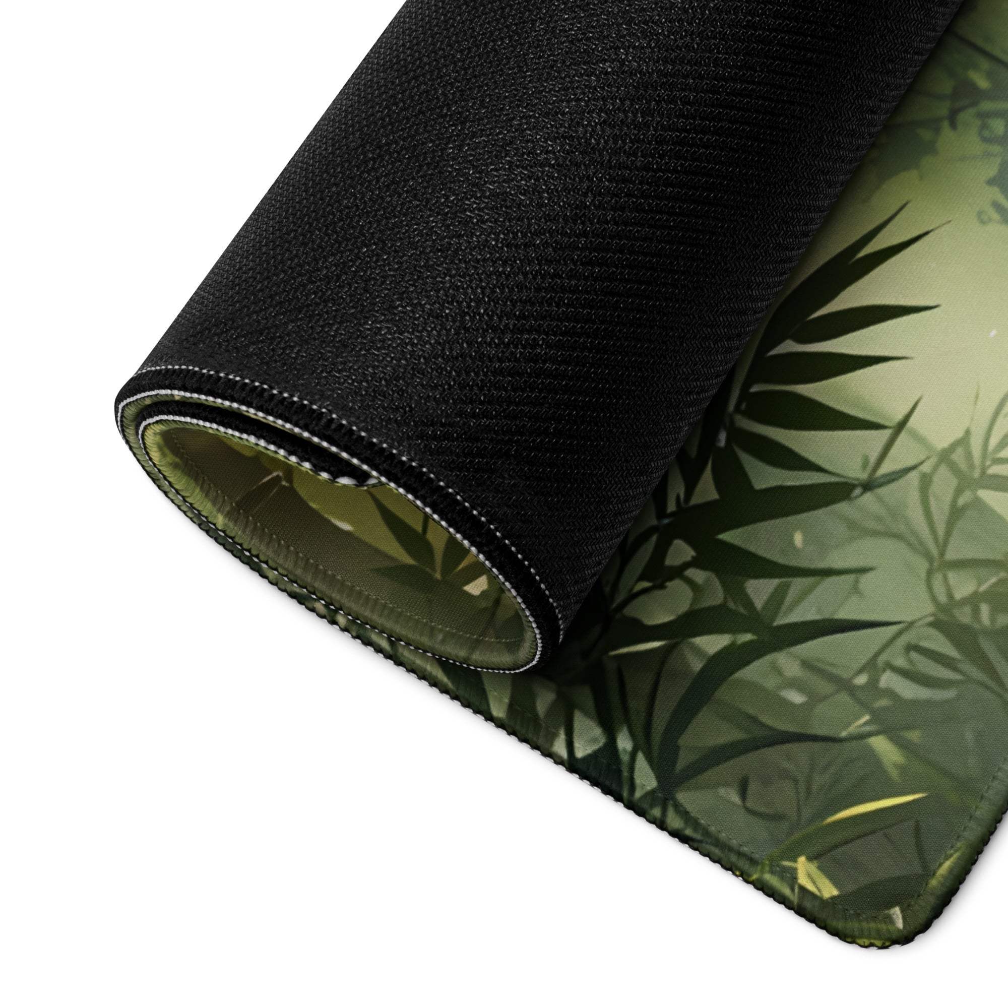 Black bamboo gaming mousepad with textured green leaf pattern and ethereal glow