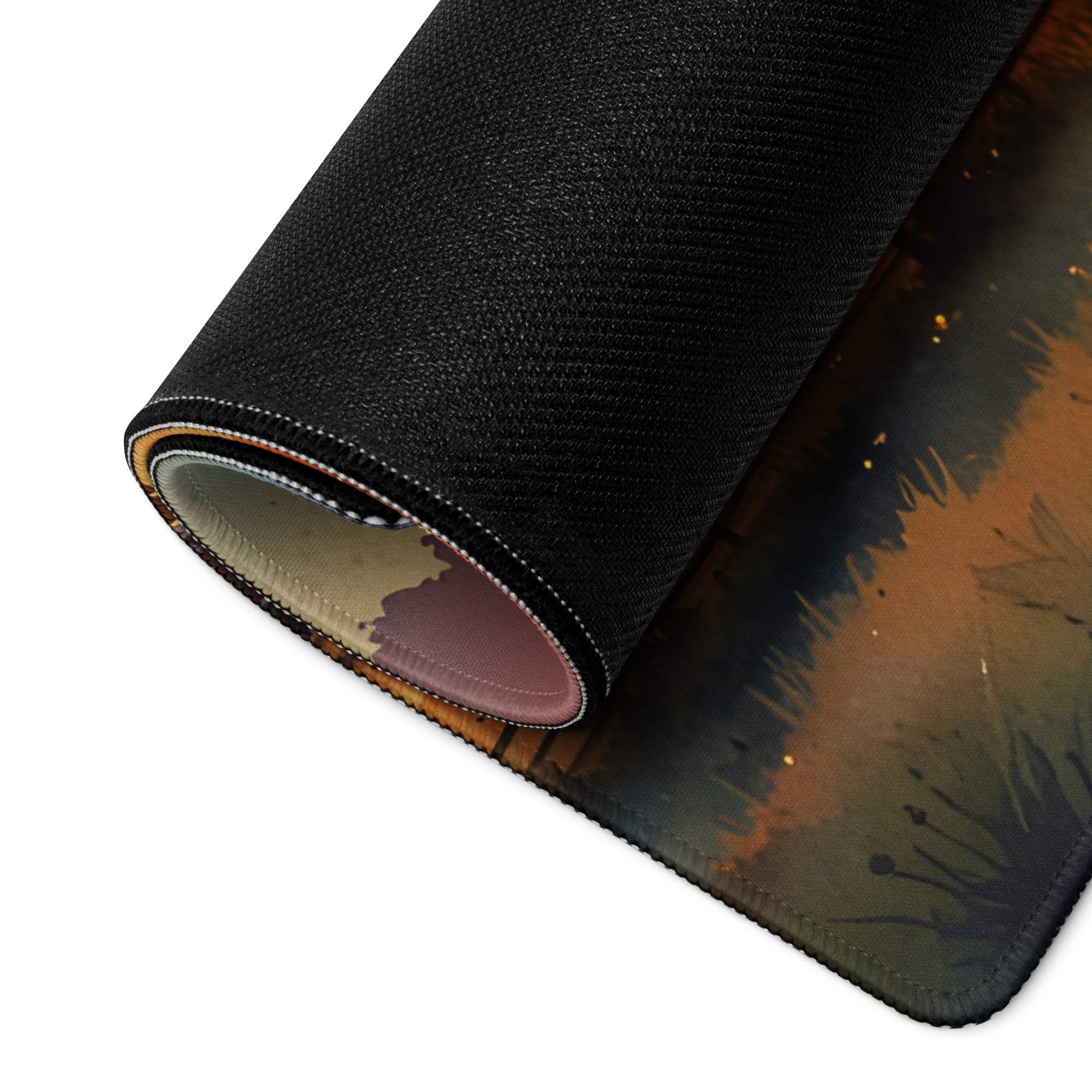 Black textured large gaming mouse pad with warm sunset forest design