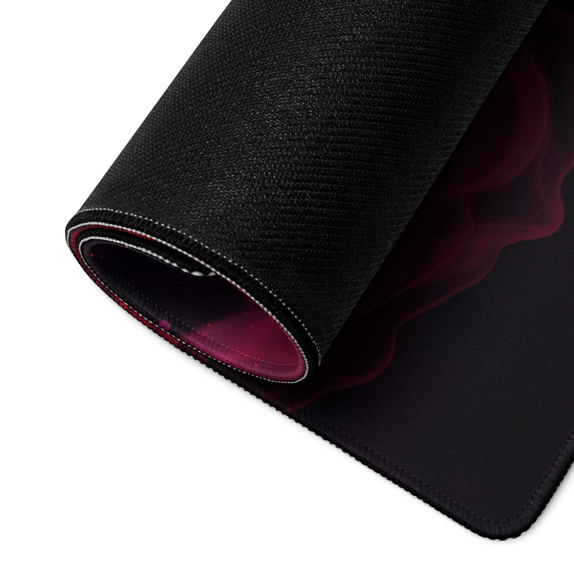 Premium ultra wide black gaming mouse pad with vivid red pink smoke design and stitched edges