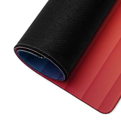 Back of large gradient rainbow gaming mouse pad with black textured outer layer, red blue lining, rolled display