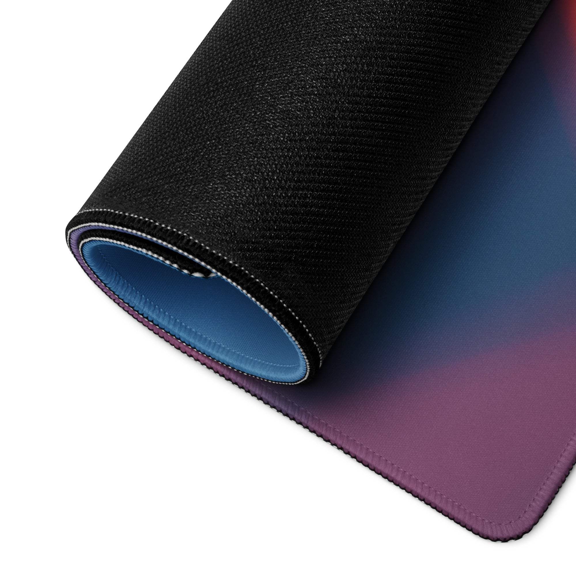 Black textured gradient blue to purple gaming mouse pad with light blue lining
