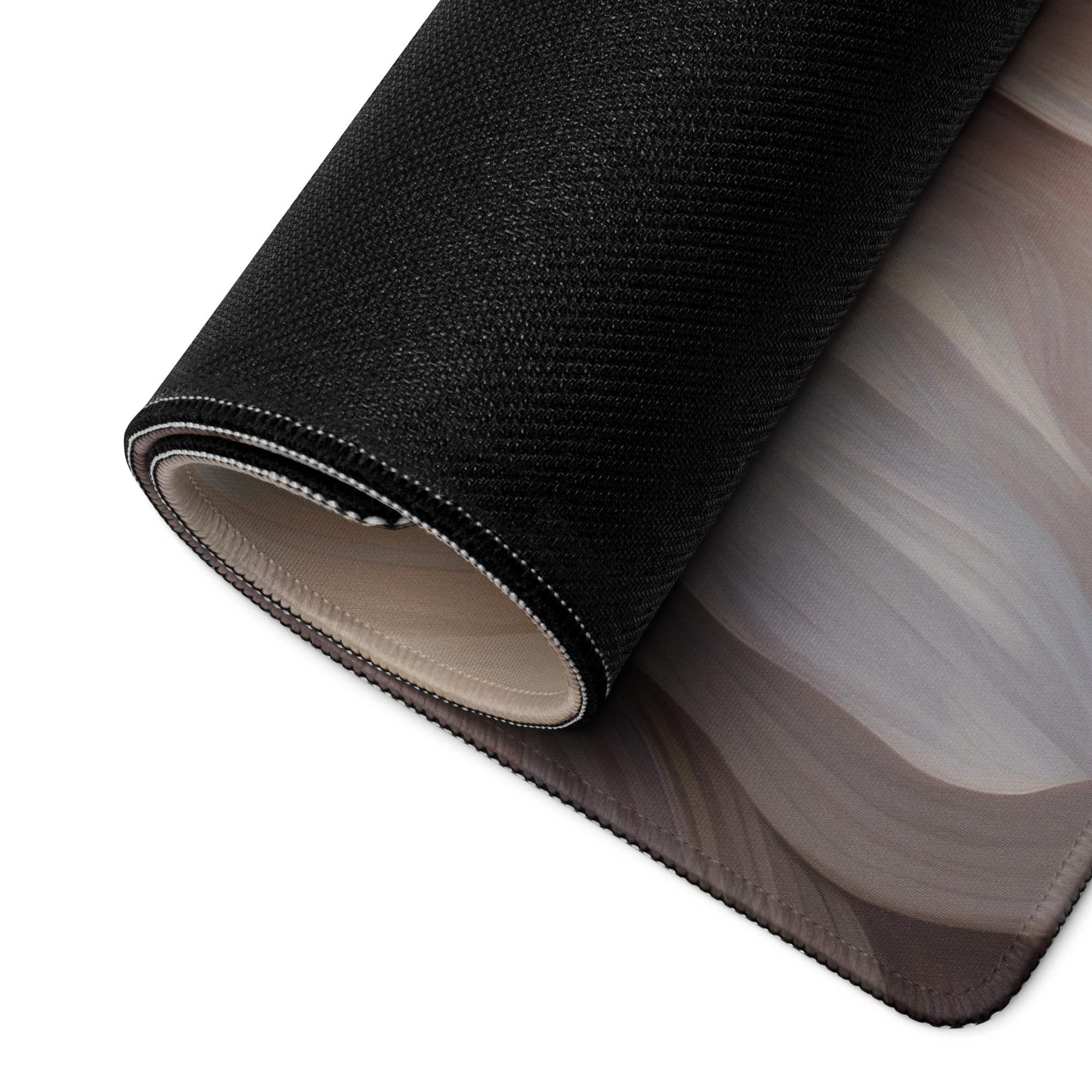 Back of elegant floral beige gaming mouse pad with black textured fabric