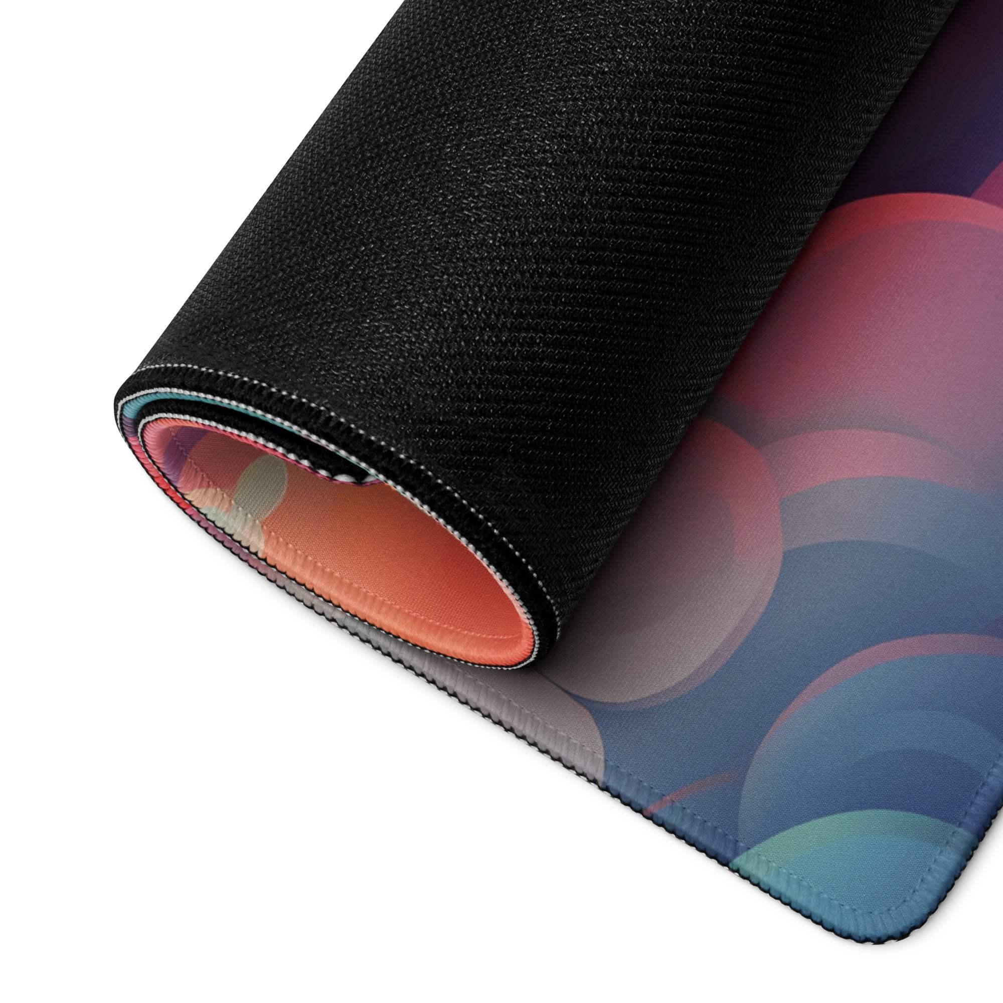 Rolled-up Dreamy Cloudscape gaming mouse pad with vibrant rainbow hues
