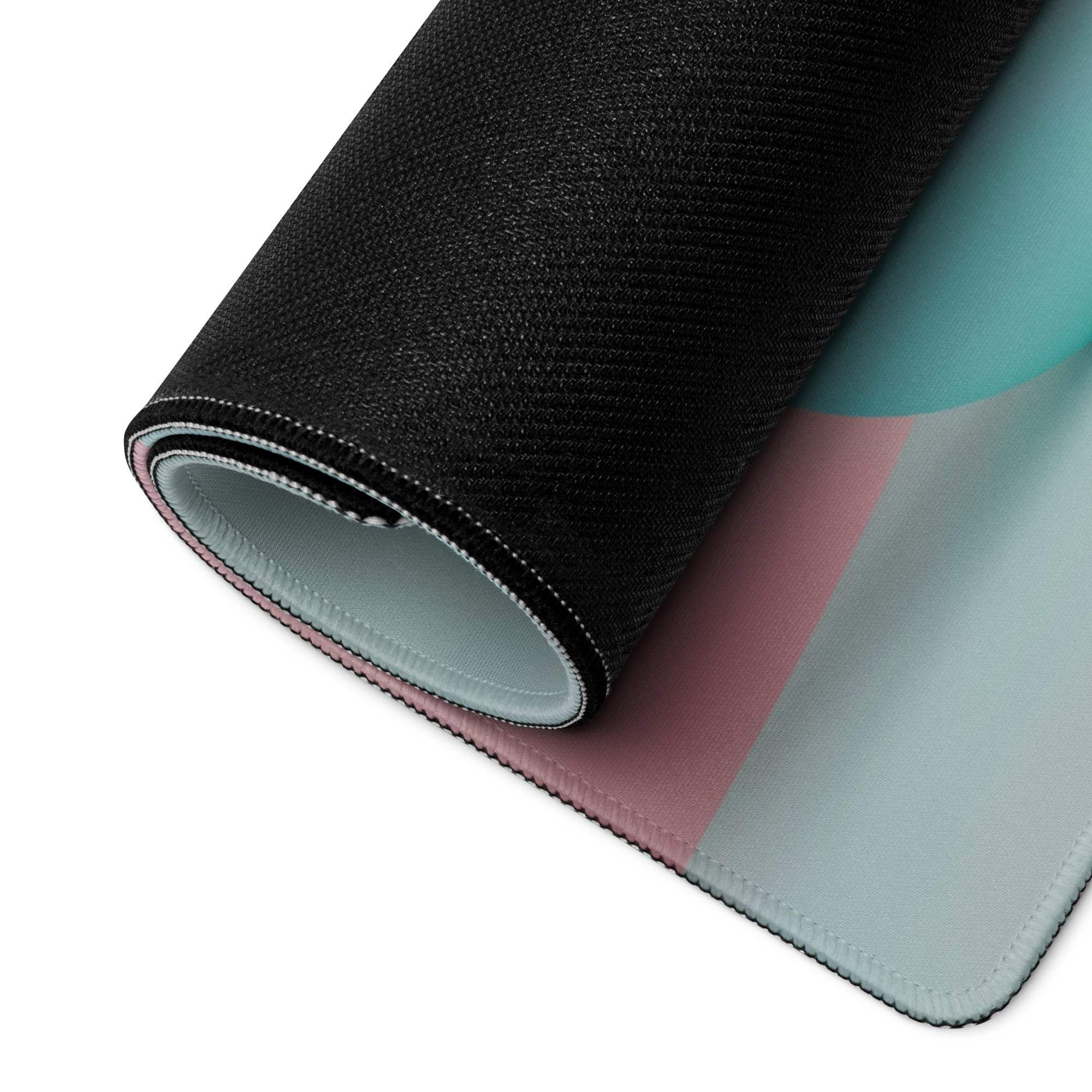 Rolled-up Pastel Planet Scene gaming mouse pad with textured pastel edge