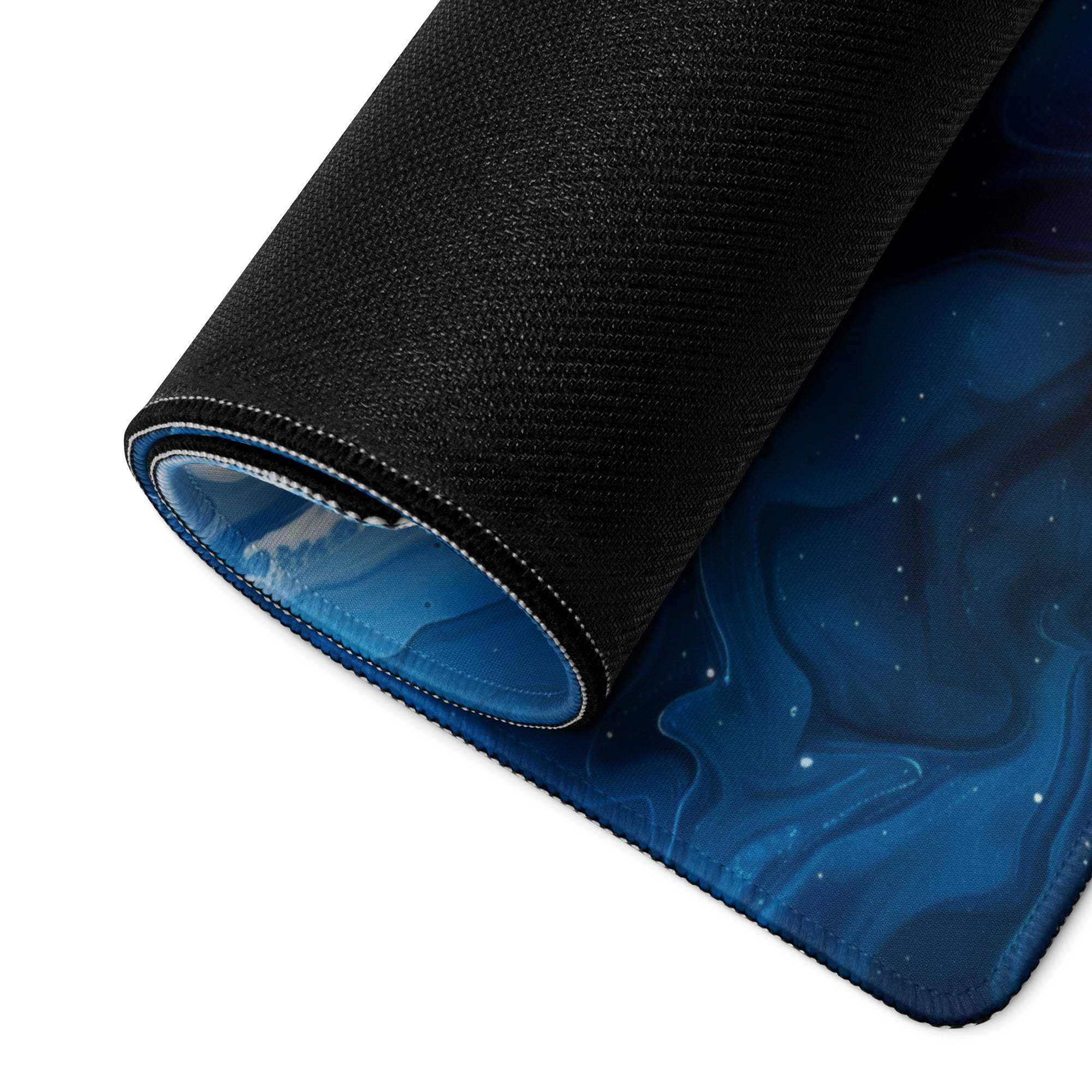 Black cosmic textured gaming mousepad with blue nebulae, stars, non-slip surface