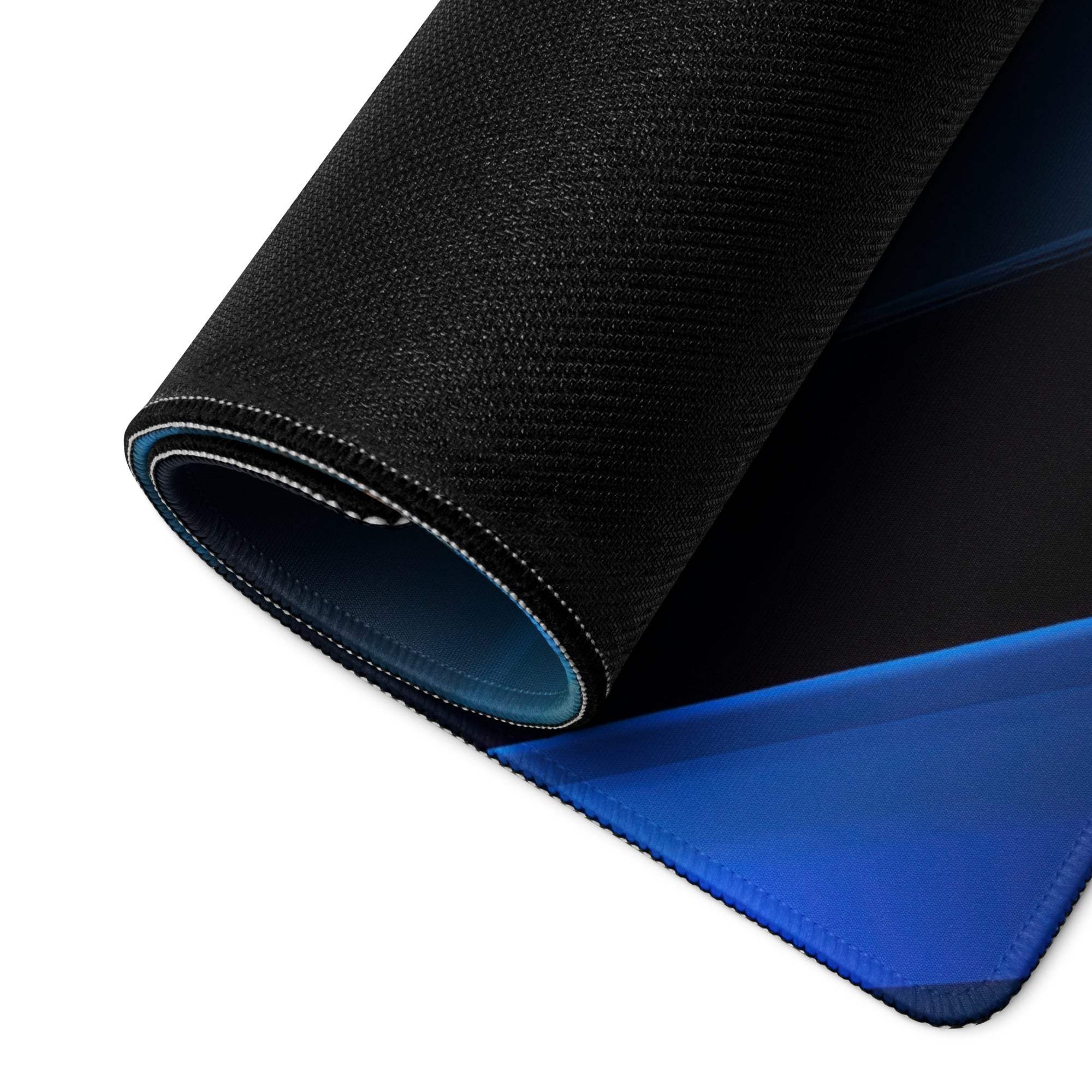 Black textured gaming mousepad back with blue underside and stitched edges