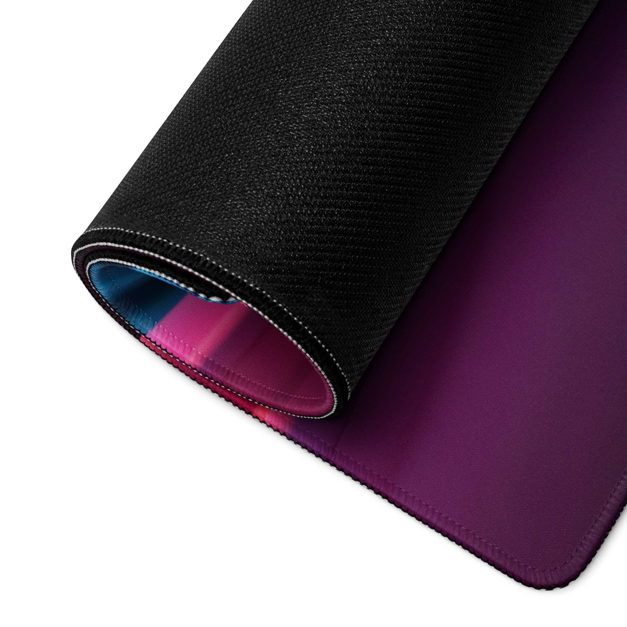 Rolled-up black Vibrant Abstract Wave gaming mouse pad with purple gradient surface