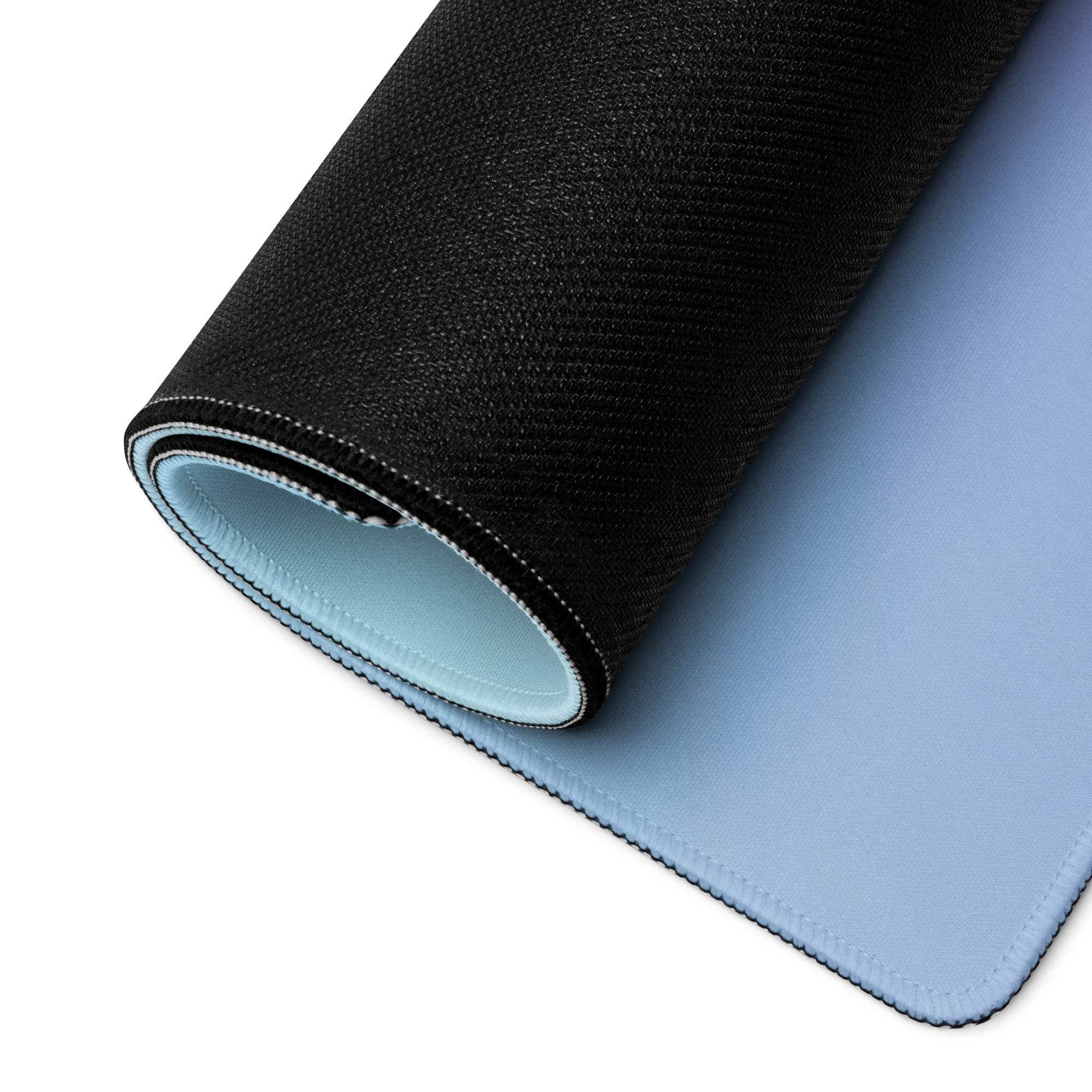 Black textured back with light blue inner surface on pastel gradient heart gaming mouse pad