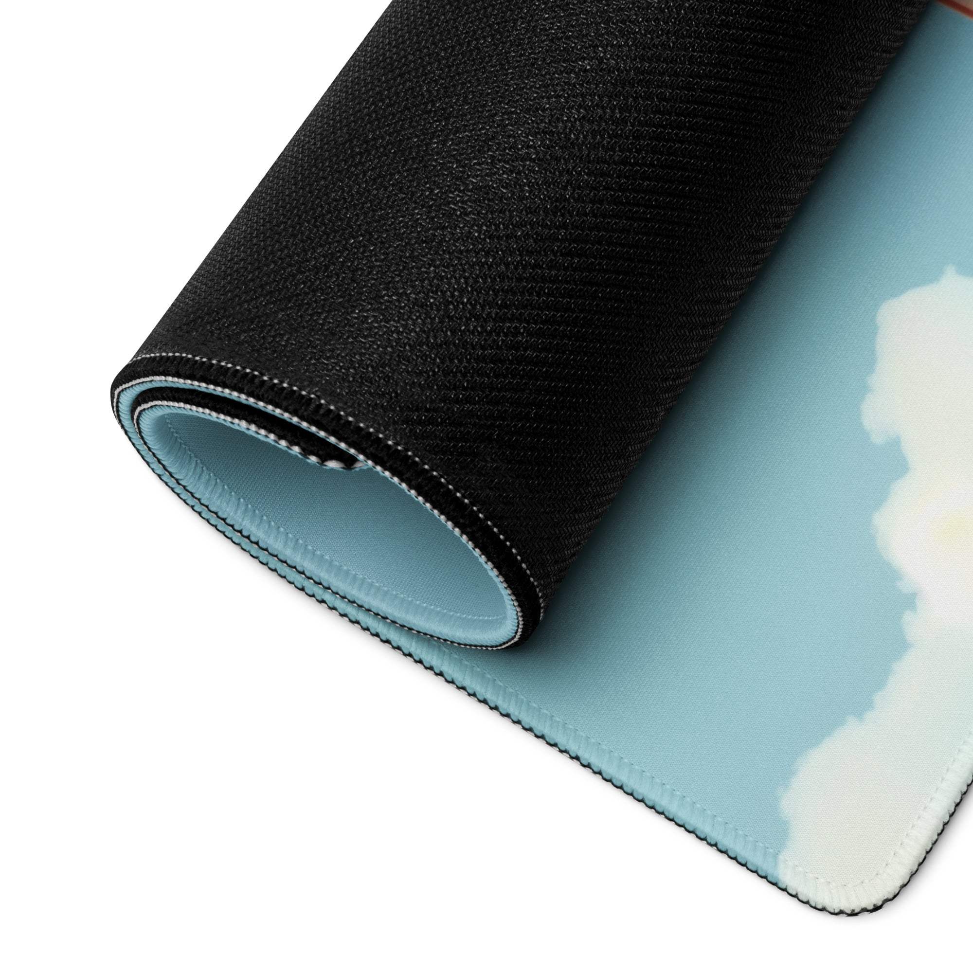 Rolled-up Pastel Sky Blue Calm gaming mouse pad with cloud design