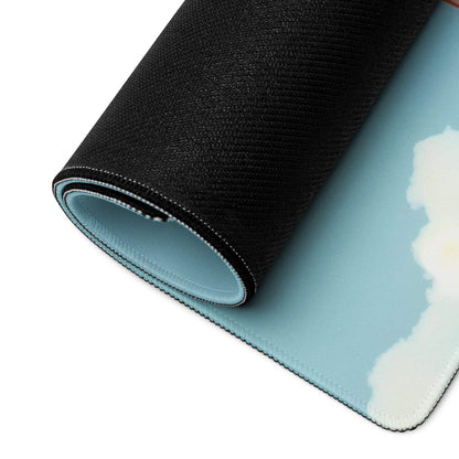 Rolled-up Pastel Sky Blue Calm gaming mouse pad with cloud design