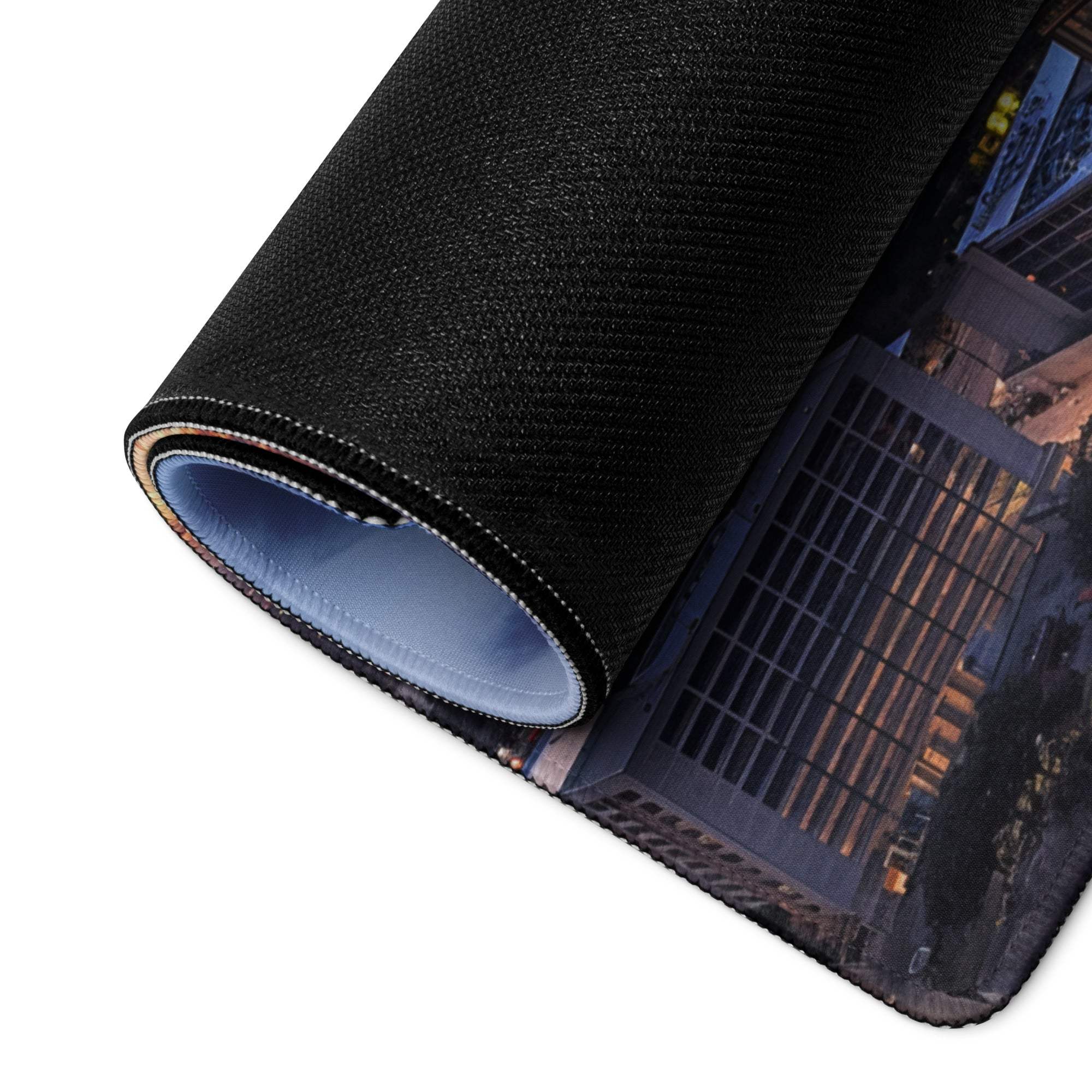 Black textured cityscape mousepad with blue lining and non-slip base