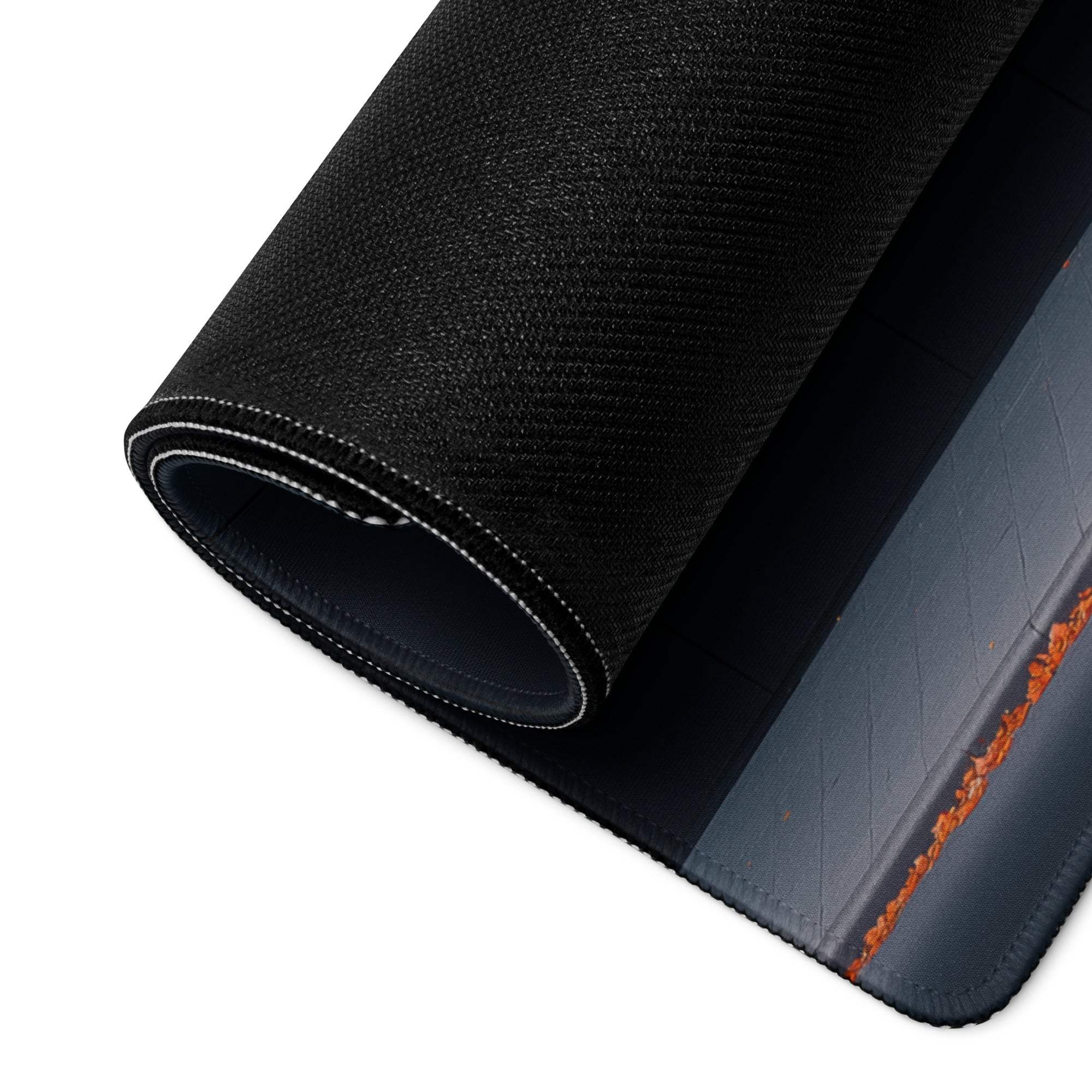 Black textured gaming mousepad with orange stitched border and Artistic Autumn design