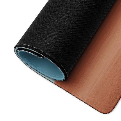 Black and tan leather mousepad rolled to show light blue lining, non-slip backing